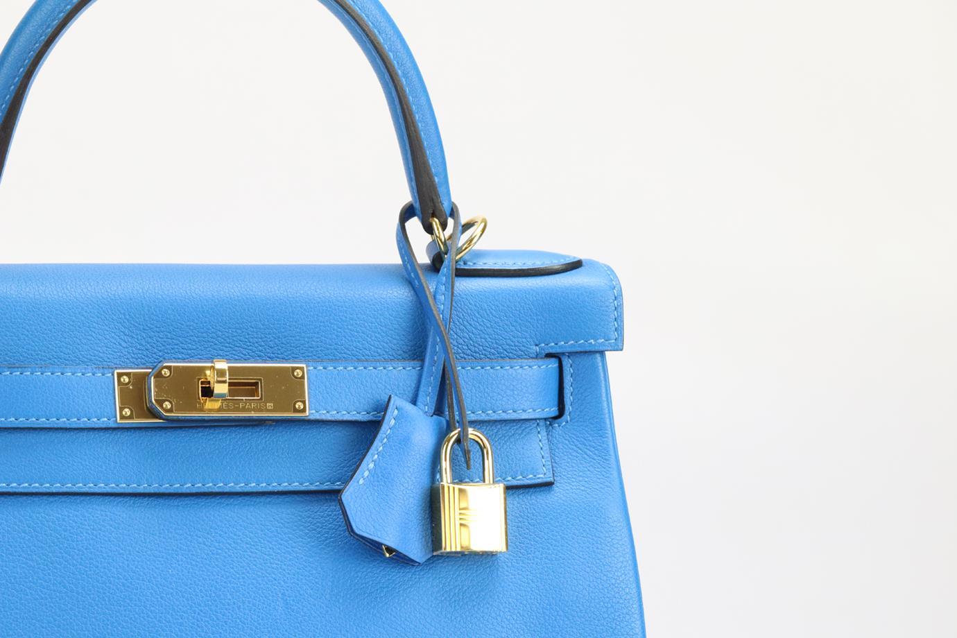 <ul>
<li>Hermès 2016 Kelly Retourne Ii 28Cm Evercolor Leather Bag.</li>
<li>Blue.</li>
<li>Twist lock fastening - Front.</li>
<li>Comes with - shoulder strap, key, lock and clochette.</li>
<li>Does not come with - dustbag or box.</li>
<li>Model: