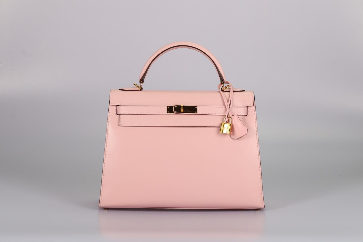 <ul>
<li>Hermès 2017 Kelly Ii Sellier 32 Cm Box Leather Bag.</li>
<li>Pink.</li>
<li>Twist lock fastening - Front.</li>
<li>Comes with - Key, lock and clochette.</li>
<li>Model: Kelly 32.</li>
<li>Made in France, this beautiful 2017 Hermès ‘Kelly II