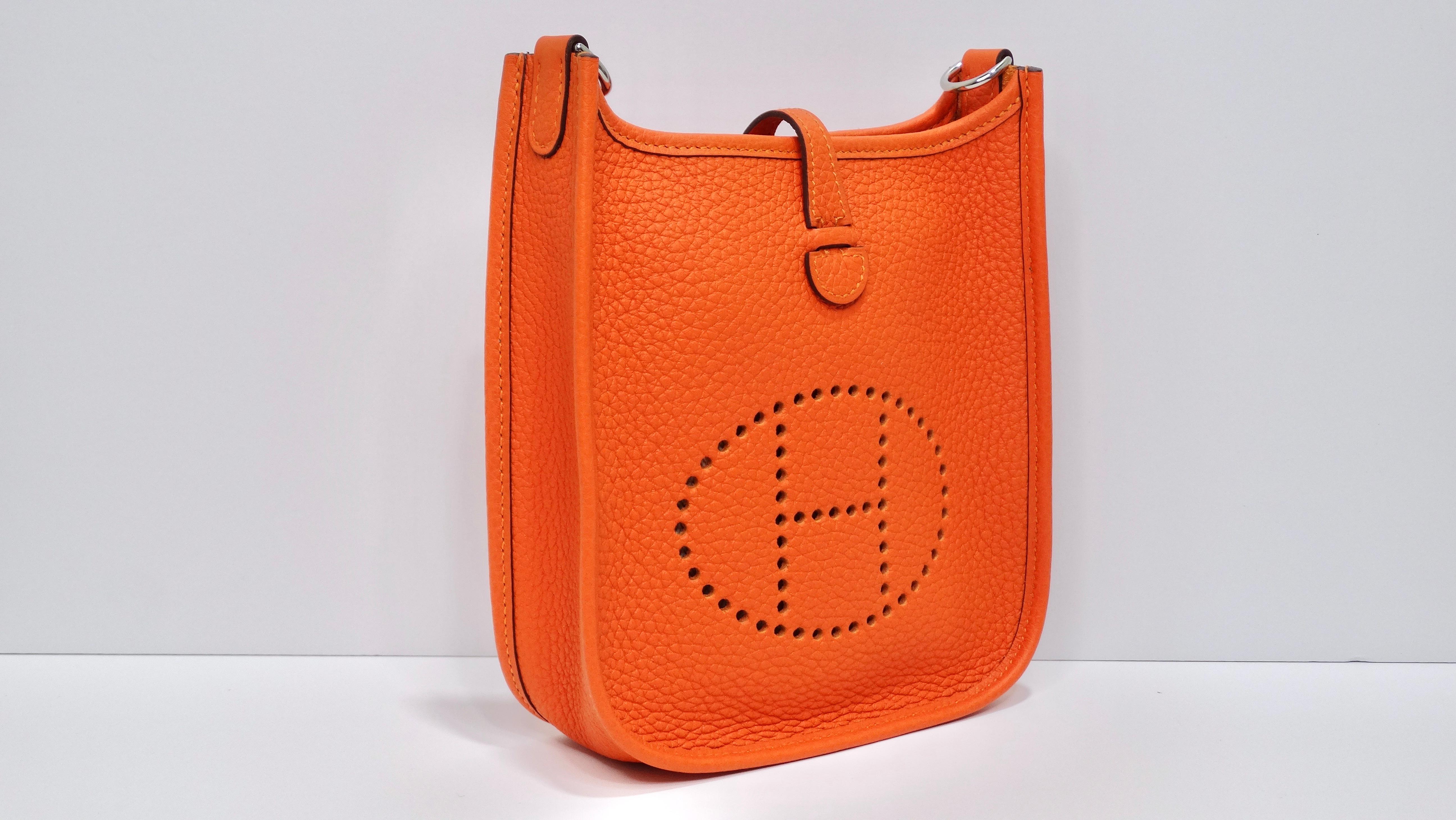 Hermès 2022 Orange Clemence Evelyne TPM Silver Hardware In New Condition In Scottsdale, AZ