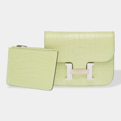 Hermès 2024 Constance Slim Yellow Alligator Clutch with Silver Trim