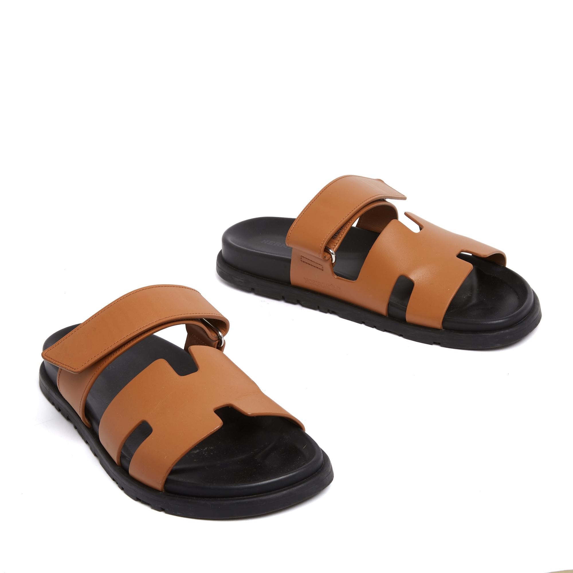 Hermès Cyprus model sandals in camel leather with wide adjustable straps with velcro, black leather insole on an anatomical rubber sole. Size 40FR or UK6.5 and US9. The sandals have been worn a few times but they are in excellent condition, already