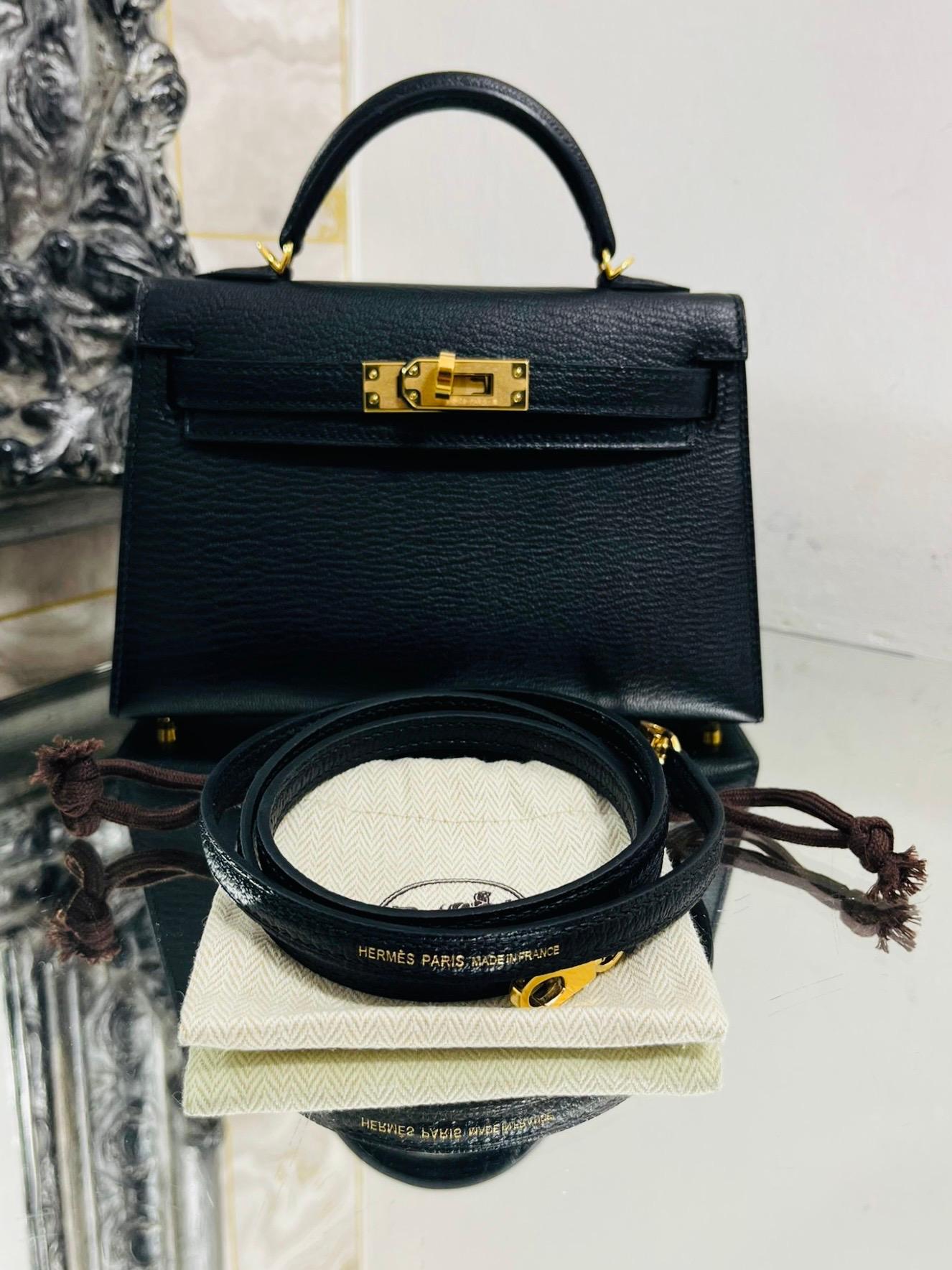 Hermes Mini Leather Mini Kelly Bag

Much sought after and bag of the moment, black Mysore Chevre leather and gold plated hardware. Top carry handle, detachable crossbody shoulder strap and twist lock closure.

2023 date stamp.

Size -  Mini - Height