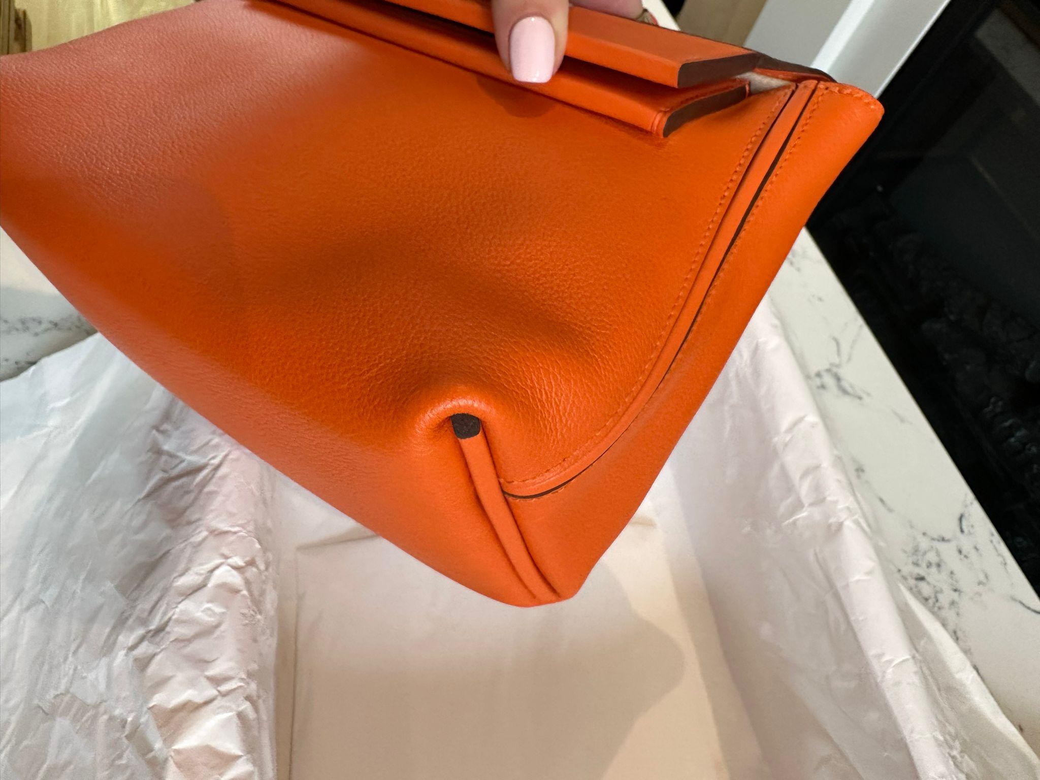 HERMÈS 24/24  mini handbag in Feu Evercolor leather with Palladium hardware In New Condition In London, England