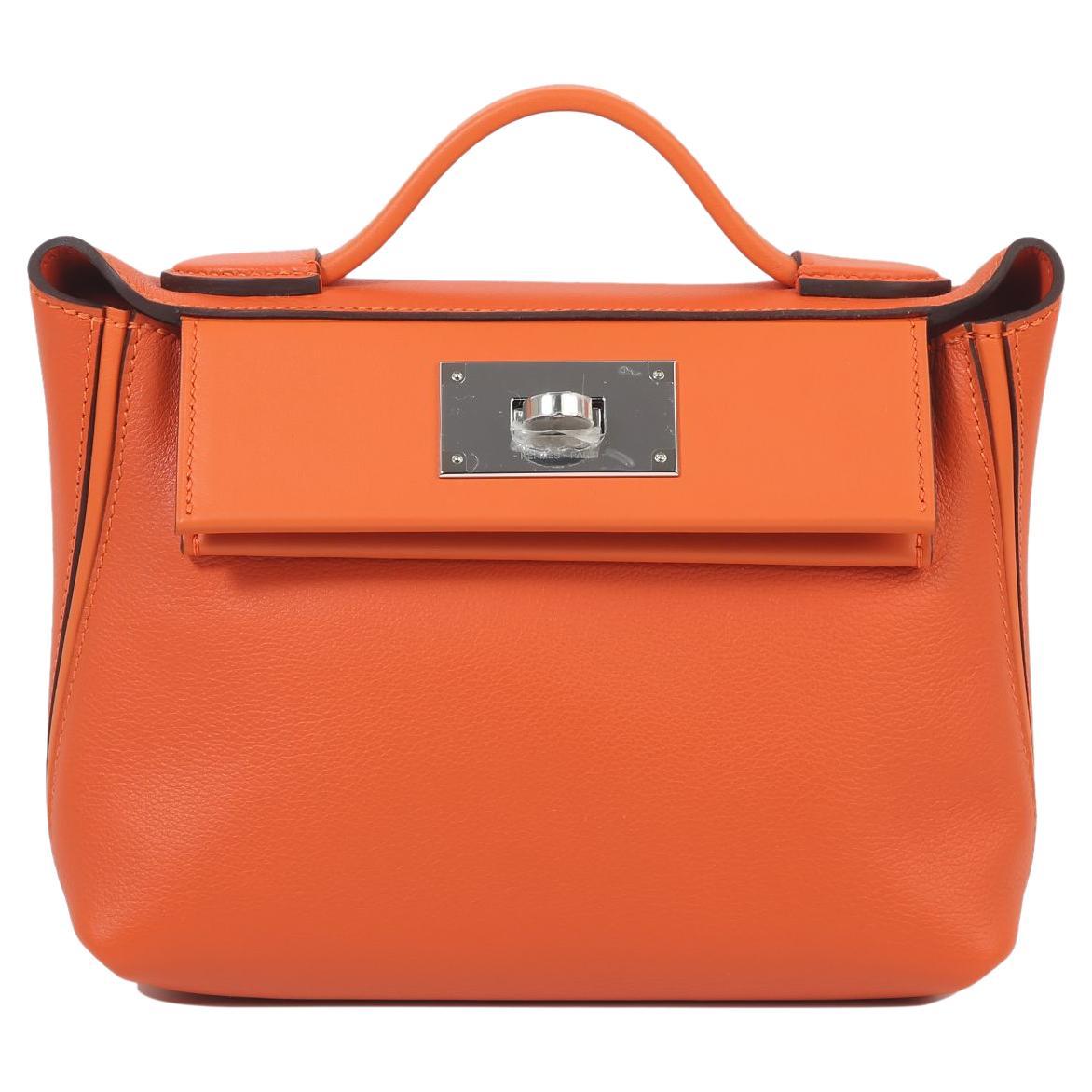 HERMÈS 24/24  mini handbag in Feu Evercolor leather with Palladium hardware