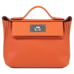 HERMÈS 24/24  mini handbag in Feu Evercolor leather with Palladium hardware