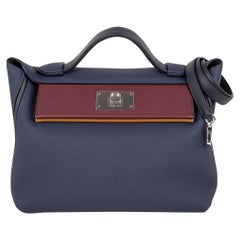 Bolso Hermes 24/24 29 Azul Nuit / Índigo / Burdeos / Kraft Togo / Swift Paladio