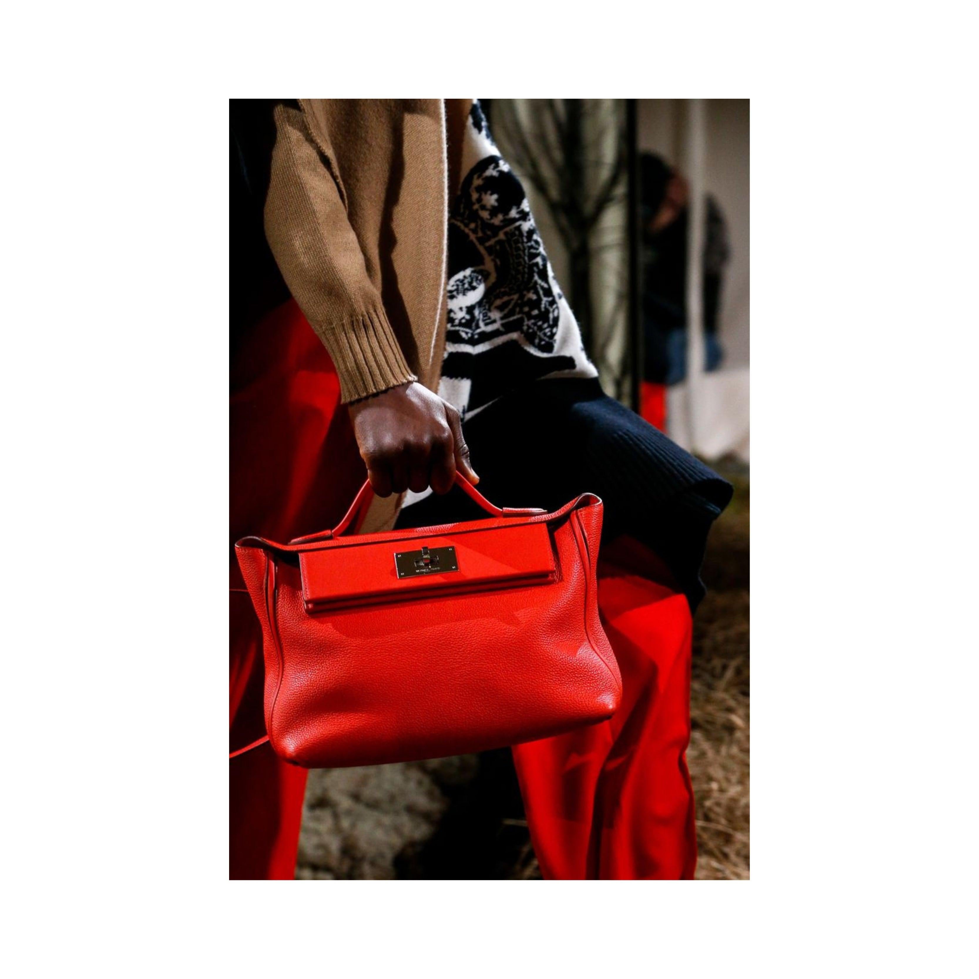 The Hermès' 24/24 Etain bag made its debut in the brand's pre-fall 2018 collection. 
 Its distinctive flap and twist-lock closure work well for keeping items secure when on the go. The smaller size 29 can be worn as a crossbody during the day and