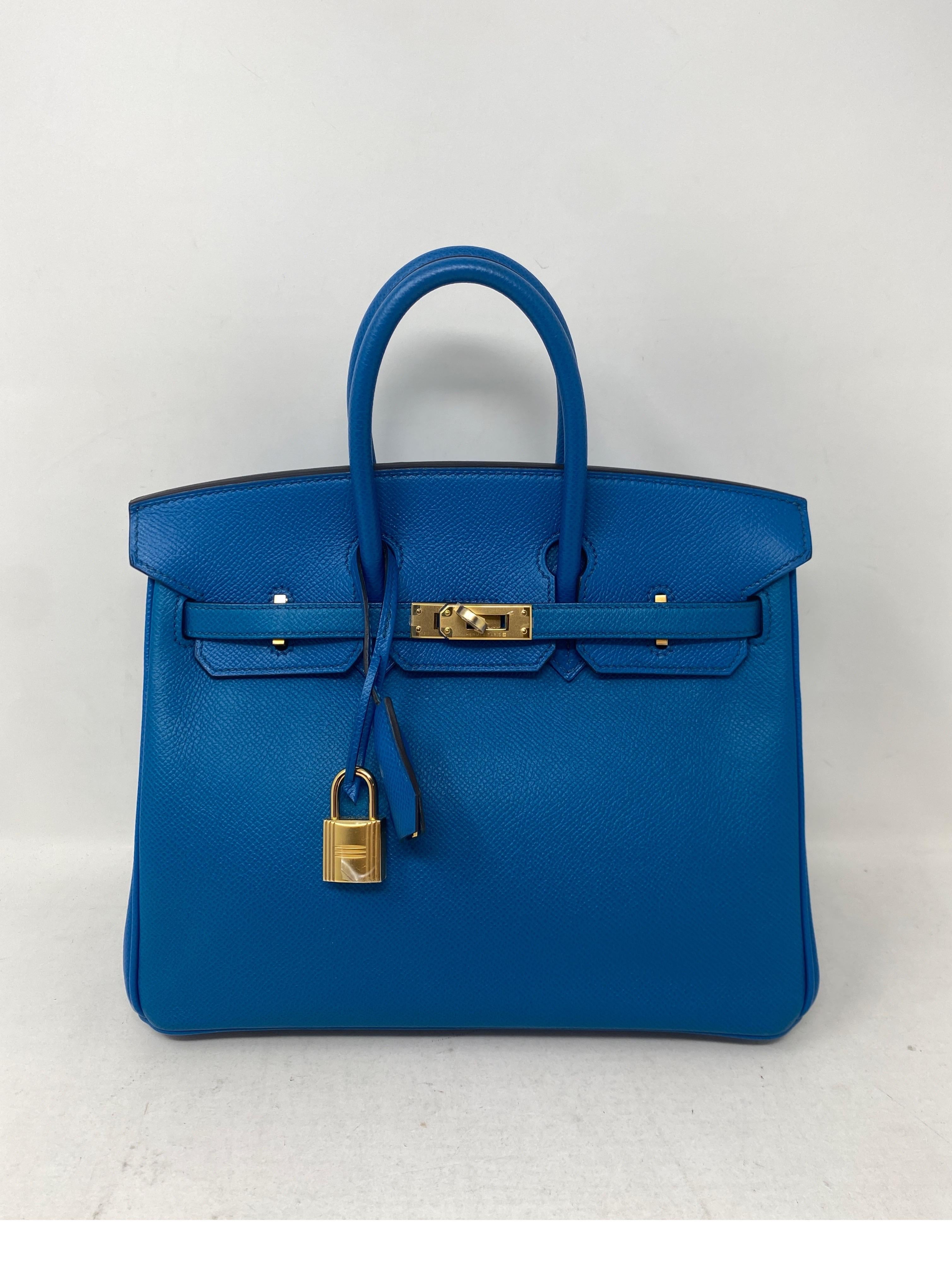 Hermes Blue Izmir Birkin 25 Bag. Excellent like new condition. Looks like new. Rare blue vibrant color bag. Unicorn 25 size. Gold hardware. Epsom leather. Includes clochette, lock, keys, and dust bag. Guaranteed authentic. 