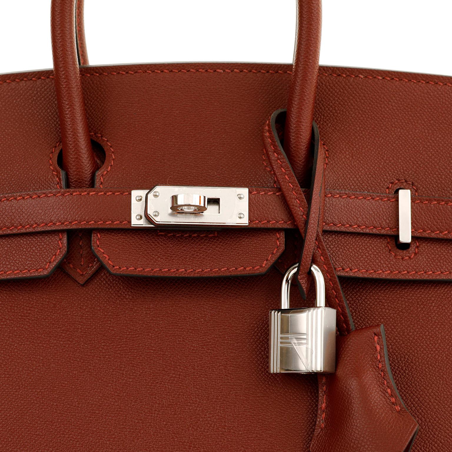 This authentic Hermès 25 cm Bordeaux Epsom Sellier Birkin is in pristine unworn condition; the protective plastic is still intact on the hardware.    Considered the ultimate luxury item, the Hermès Birkin is stitched by hand. Waitlists are