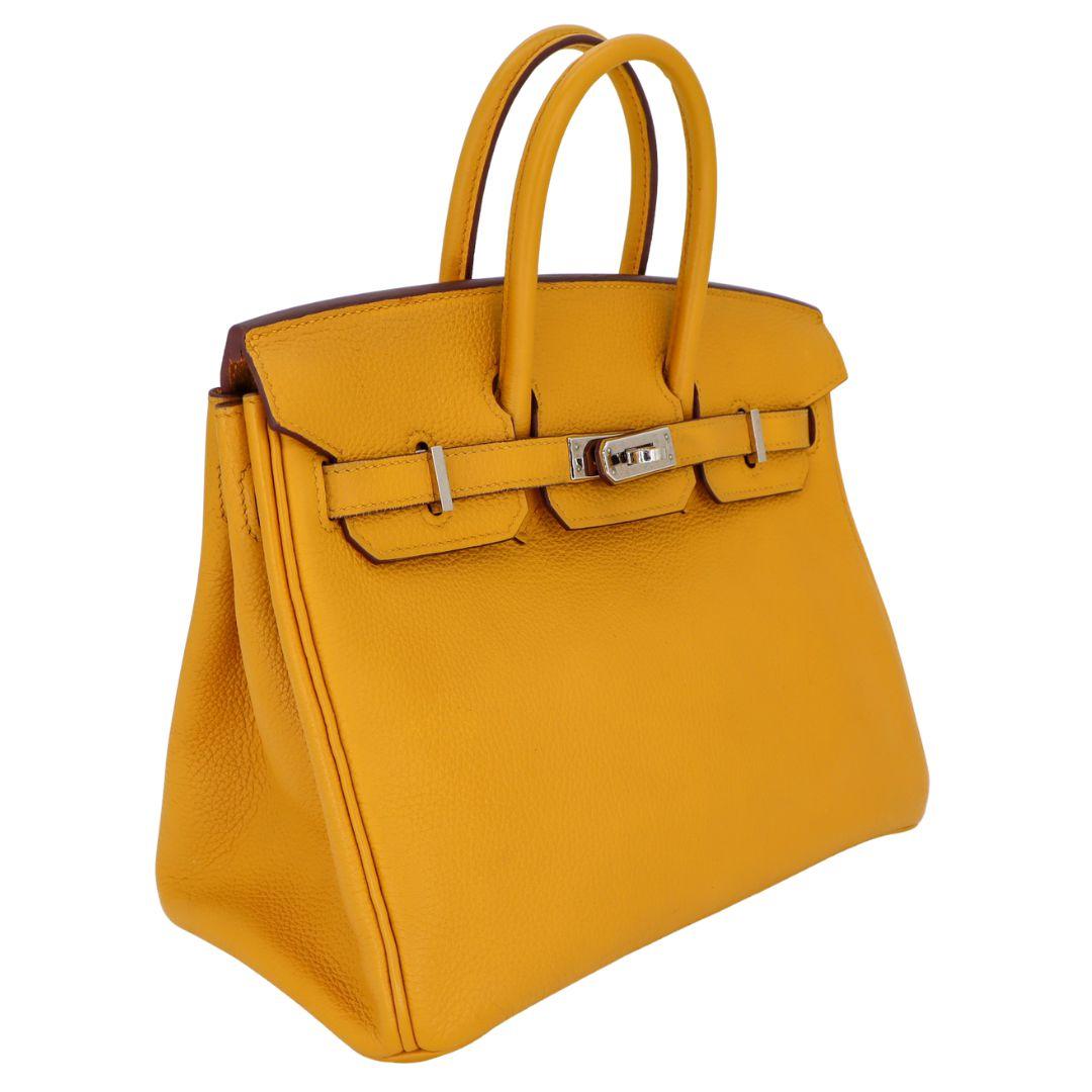 Brand: Hermès
Style: Birkin
Size: 25cm
Color: Jaune Ambre
Material: Togo Leather
Hardware: Palladium (PHW)
Dimensions: 10