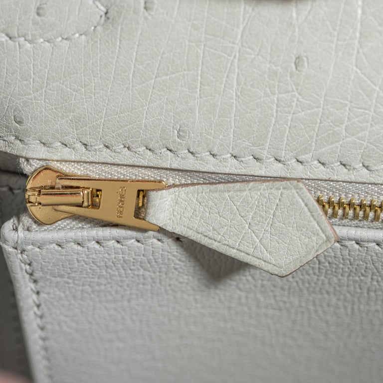 A BÉTON OSTRICH SELLIER KELLY 25 WITH GOLD HARDWARE, HERMÈS, 2022