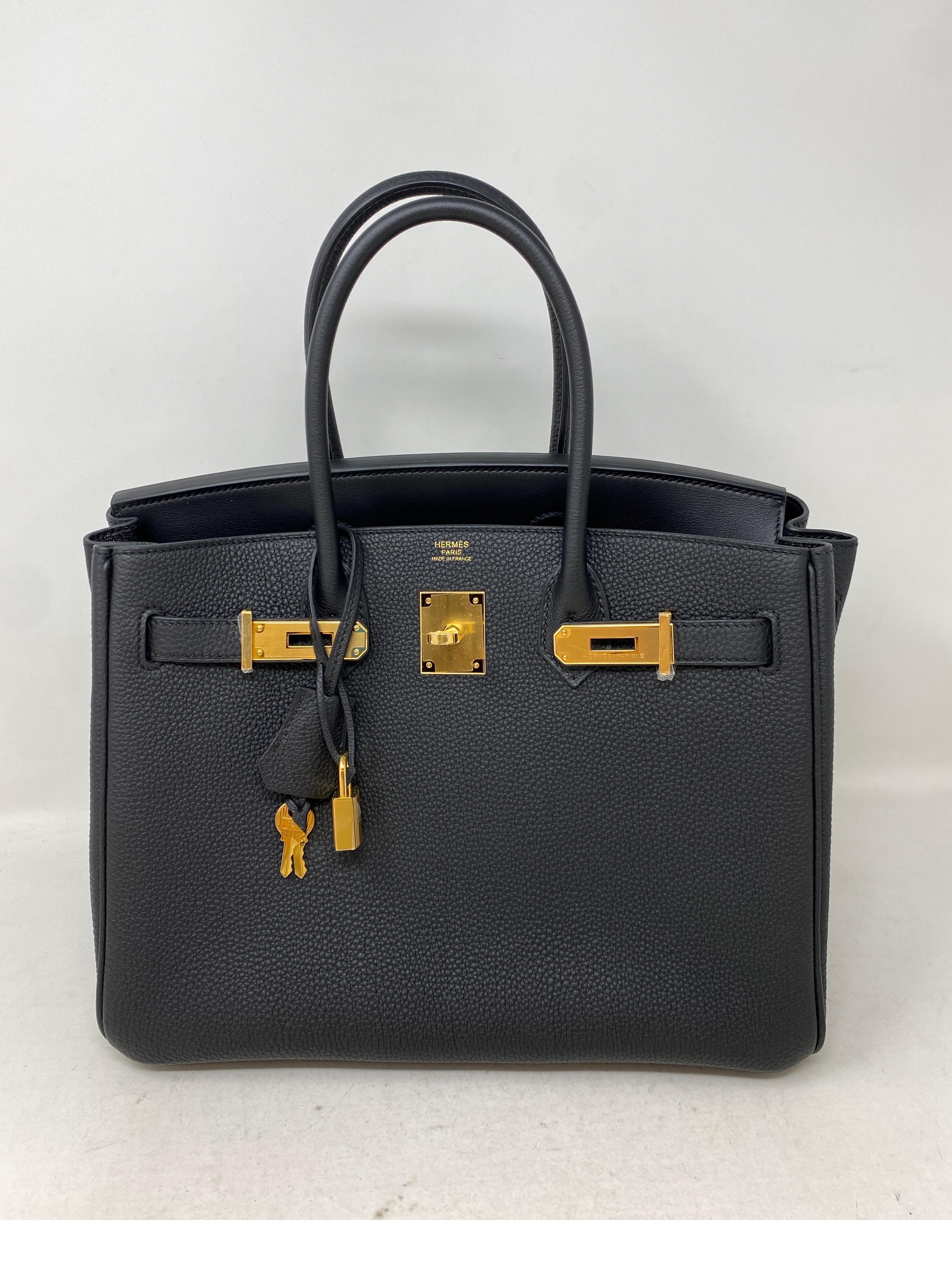 Hermes Black 30 Birkin 3 in 1 Bag. Brand new. Rare and limited. Gorgeous black and gold hardware. Includes middle insert to make this Birkin unique. You can wear it many ways. The insert comes out or can be worn in front side of bag. Insert can also