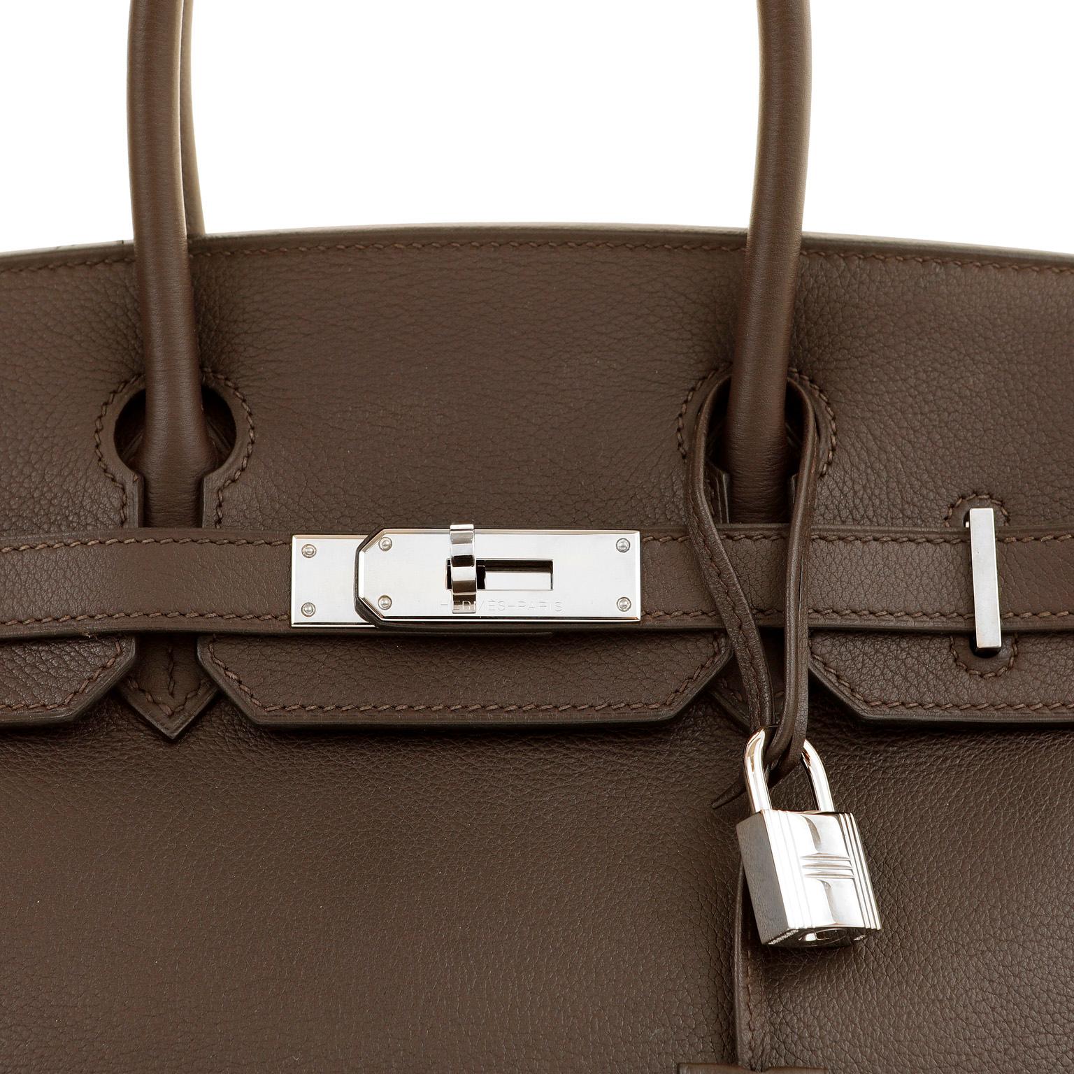 This authentic Hermès 30 cm Deep Brown Evergrain Birkin is in pristine condition.  Hand sewn and coveted worldwide; the Hermès Birkin is considered the epitome of luxury handbags.  Deep Havana Brown evokes the darkest espresso bean and is perfectly