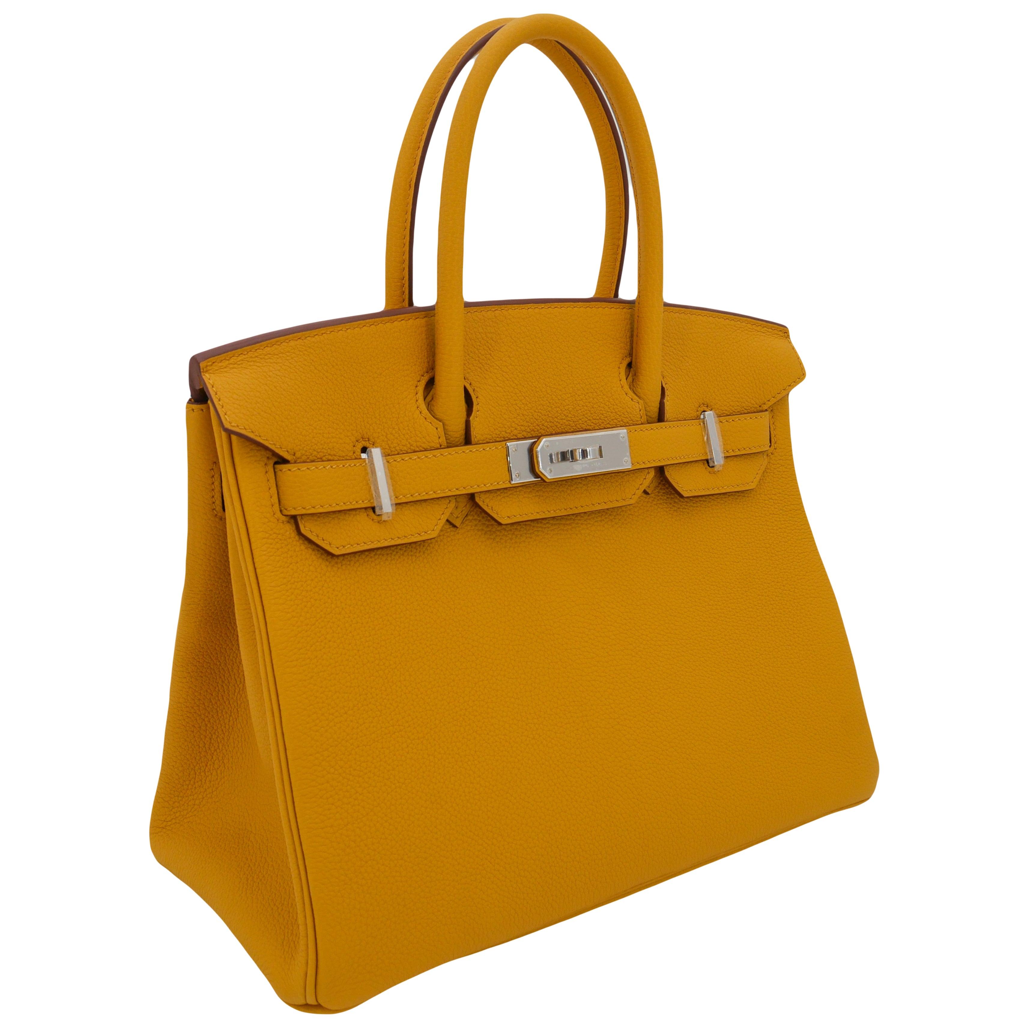 Brand: Hermès
Style: Birkin
Size: 30cm
Color: Ambre
Material: Togo Leather
Hardware: Palladium Hardware (PHW)
Dimensions: 11.75
