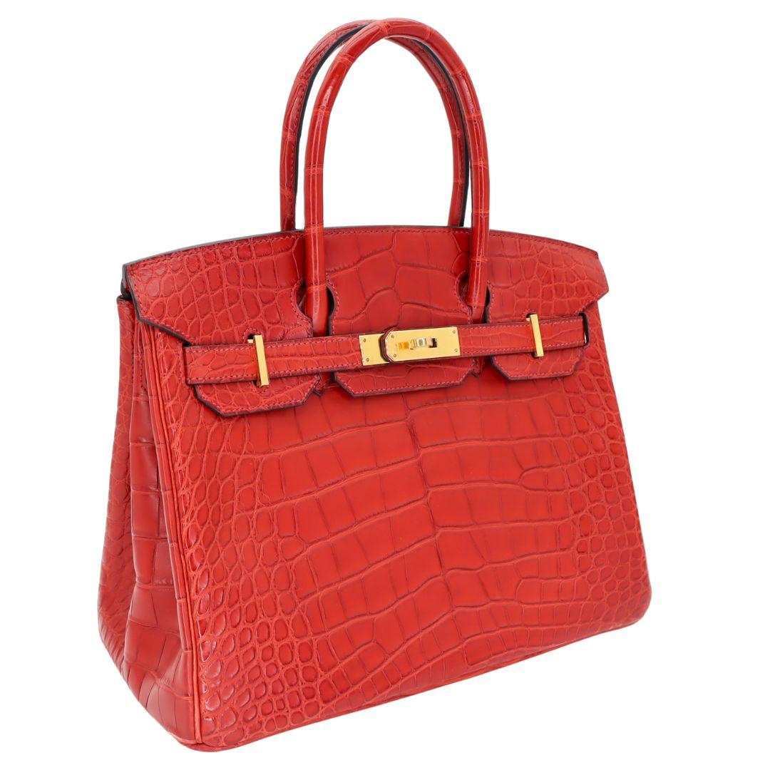 Brand: Hermès
Style: Birkin
Size: 30cm
Color: Rouge H/Orange Poppy
Material: Matte Alligator
Hardware: Gold (GHW)
Dimensions: 11.75