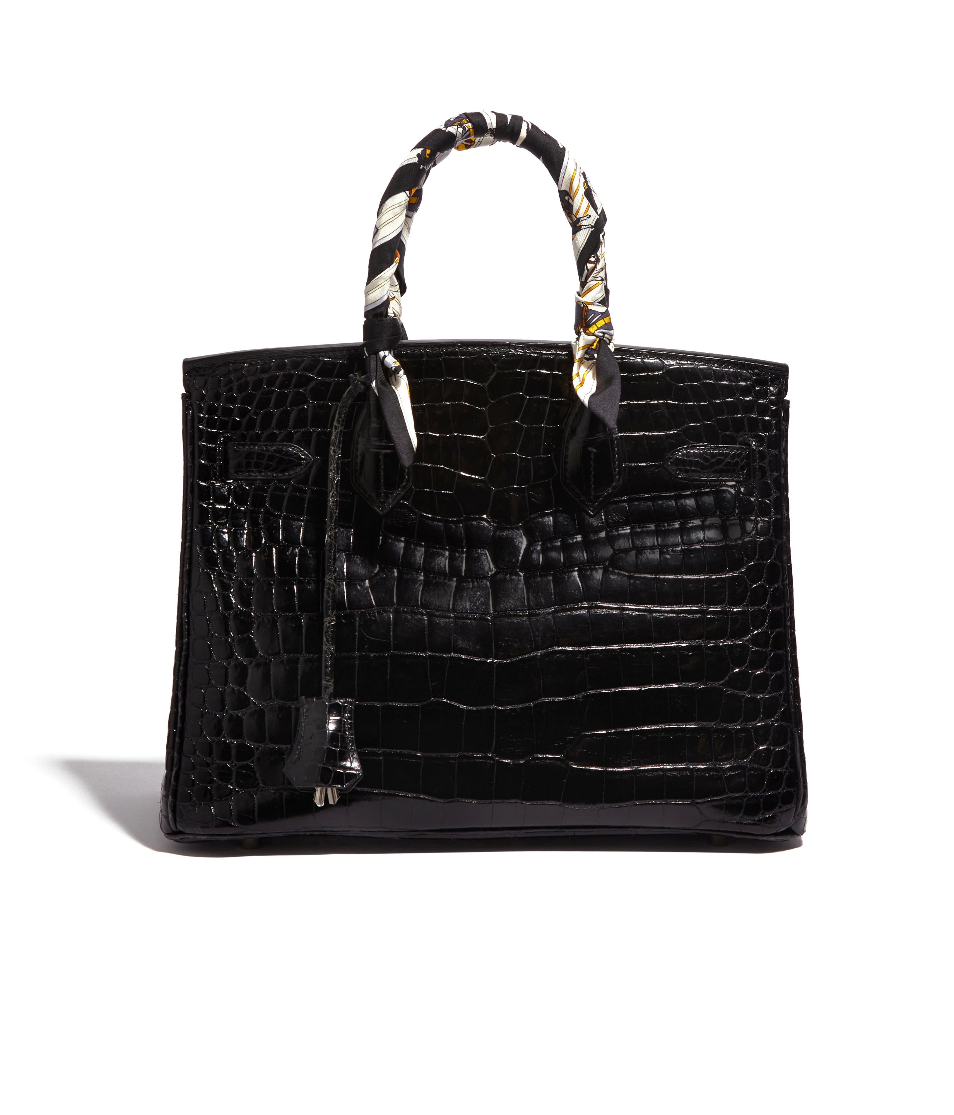 This is an exceptional 30cm Birkin in porosus crocodile skin and palladium hardware. This piece comes with a tirette, keys, padlock trimmed in matching leather and dustbag. This Birkin also has exceptional features such as double handles, the iconic