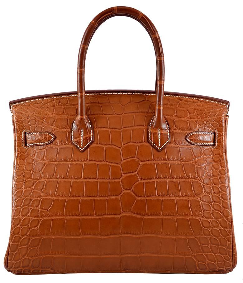 100% Authentic Hermes Birkin Bag
COLOR: Fauve Barenia
MATERIAL: Alligator Crocodile
HARDWARE: Palladium
ORIGIN: France
MEASUREMENTS: 12