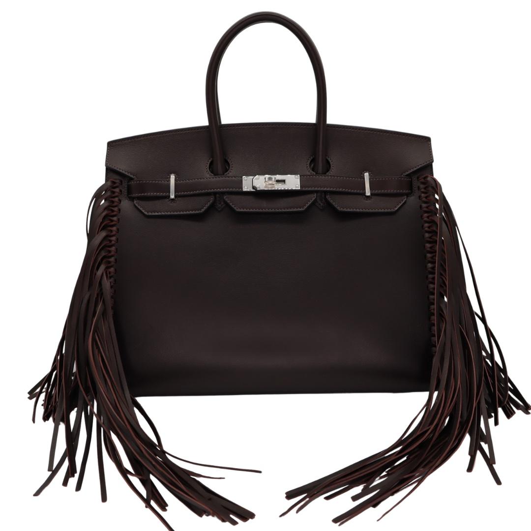 Brand: Hermès
Style: Birkin Sellier Anate Fringe
Size: 35cm
Color: Ebene
Material: Evergrain Leather
Hardware: Palladium Hardware (PHW)
Dimensions: 13.75