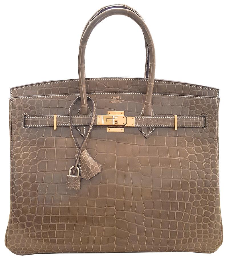 HERMES 35cm Poussiere Porosus Birkin Crocodile Bag with Gold Hardware
100% Authentic Hermes Birkin Bag
COLOR: 
MATERIAL: Crocodile
HARDWARE: Gold
ORIGIN: France
INCLUDES: Dustbag, lock, and key