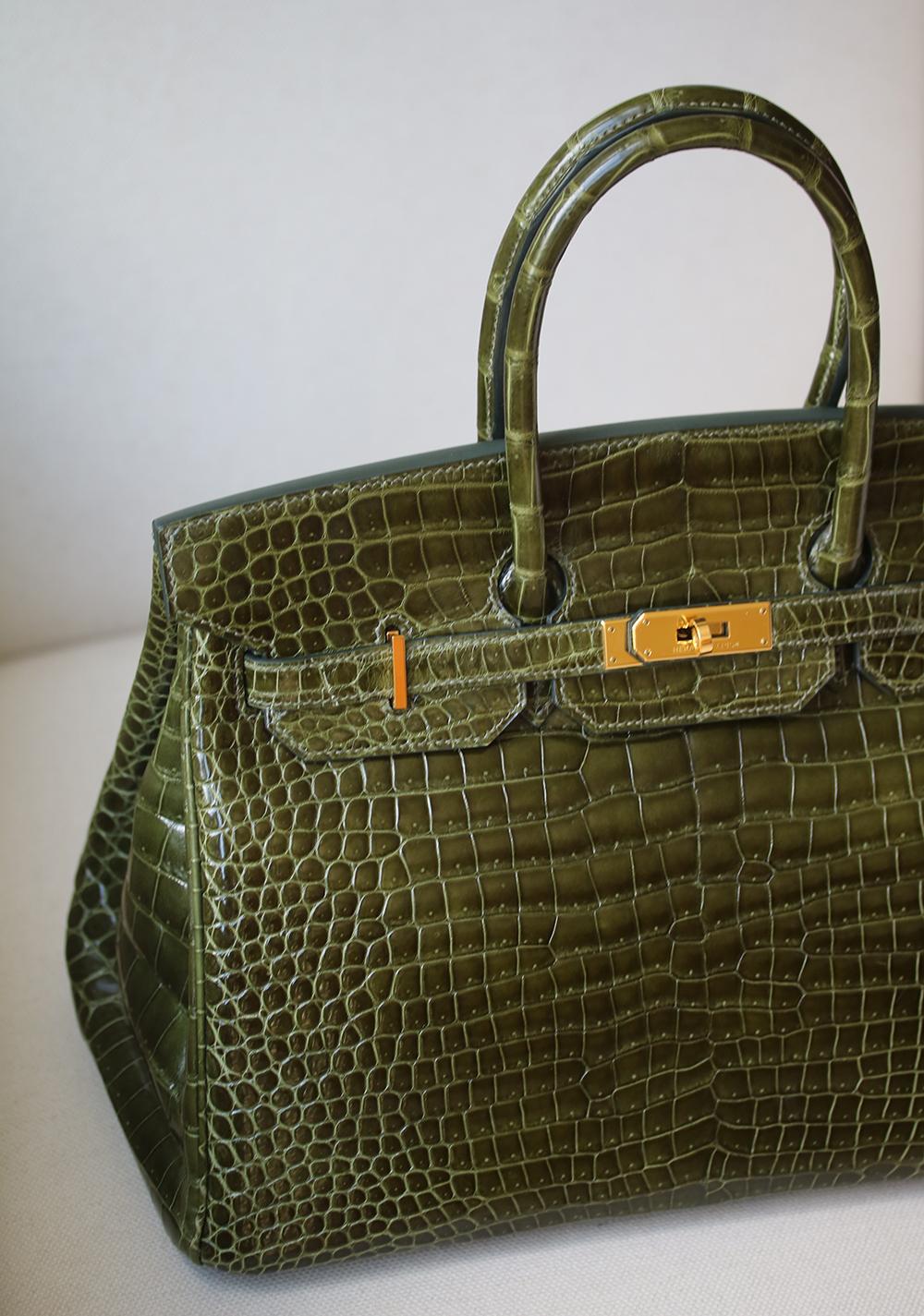 Hermès Vert Smooth Porosus Crocodile 35 cm Birkin Bag with Gold Hardware. The most fabulous of all bags can be yours today! Luxuriously rich coloured with tonal top stitching. This Birkin is in excellent condition. Only lightly used. Has been