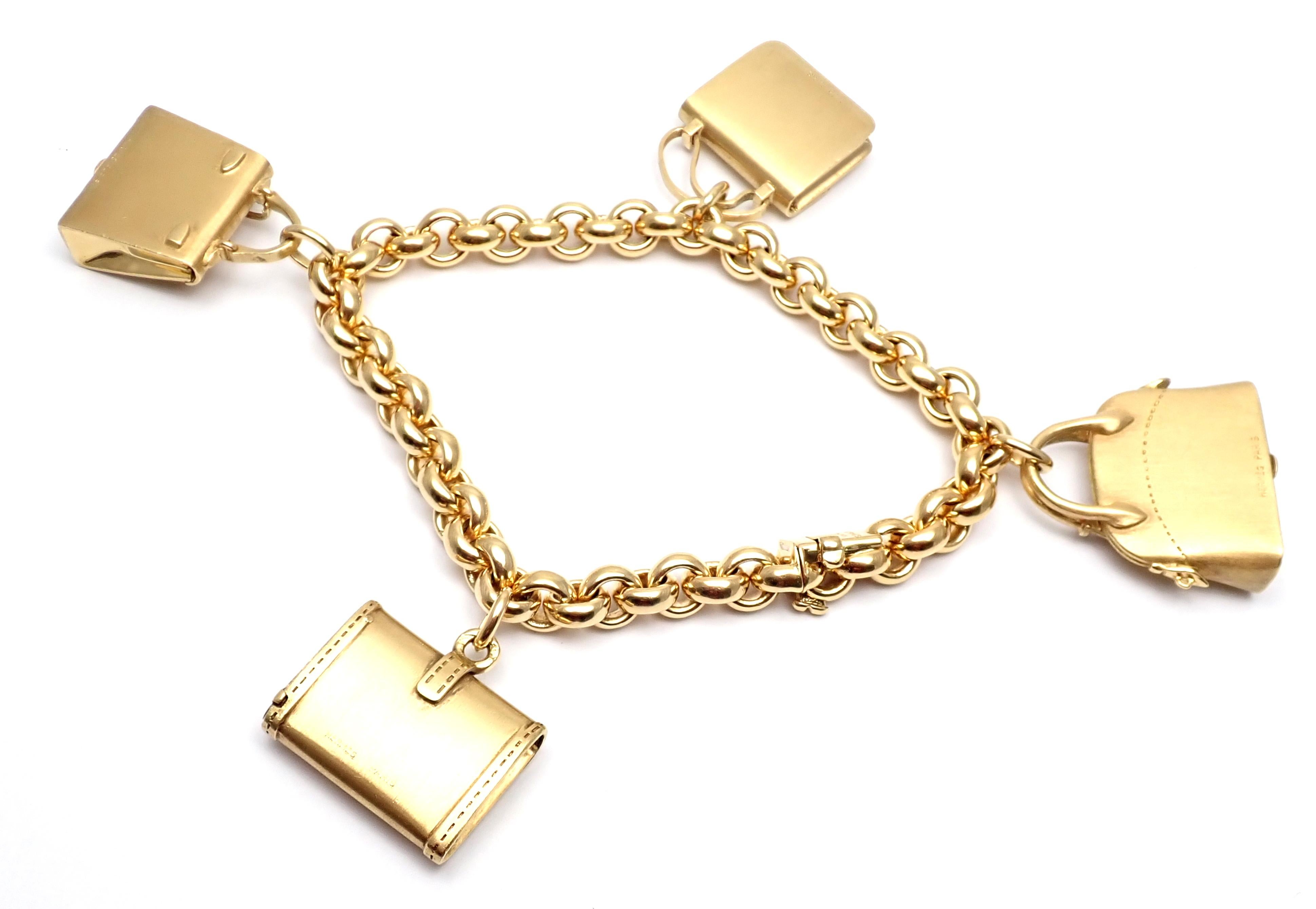 18k Yellow Gold 4 Hanging Bag Charm Link Bracelet by Hermes. 
Includes a total of 4 Hermes bag charms: 
With Constance bag 23mm x 18.5mm
Clutch bag 24mm x 19mm
Kelly bag 20mm x 22mm
Bolide bag 26mm x 24mm
Details: 
Weight: 89.6grams 
Length: 7.25