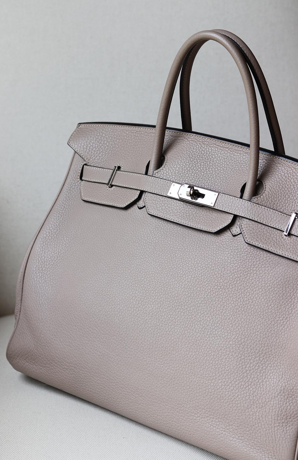 Hermès 40cm Clemence Birkin Bag with Palladium hardware.
Top handle straps.
Tonal leather lining.
Double slit pocket and zip pocket on interior walls.
Turn-lock closure at front. 
Colour: Gris (light stone-grey)
Does not come with dustbag, lock,