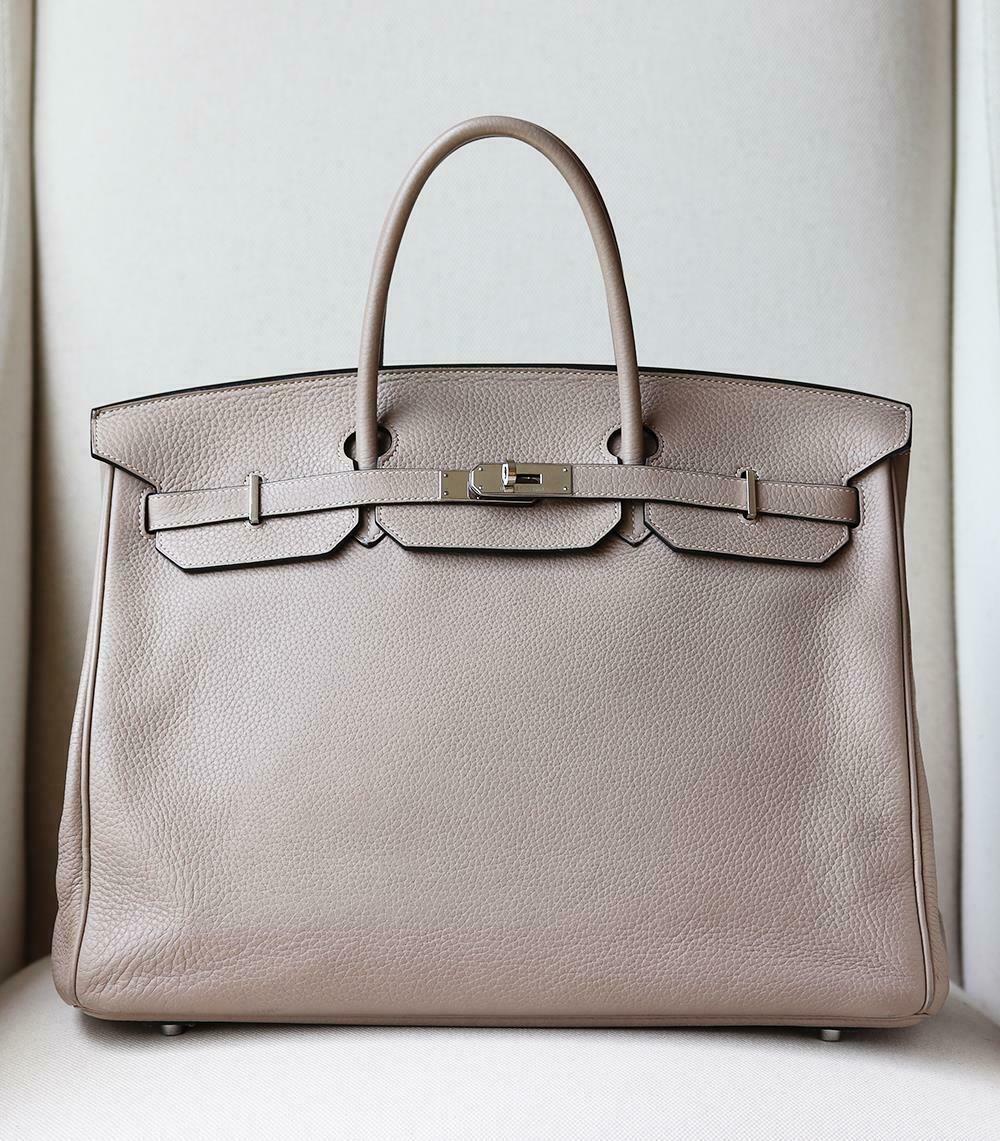 Hermès 40cm Clemence Birkin Bag with Palladium hardware.
Top handle straps.
Tonal leather lining.
Double slit pocket and zip pocket on interior walls.
Turn-lock closure at front. 
Colour: Gris (light stone-grey)
Does not come with dustbag, lock,