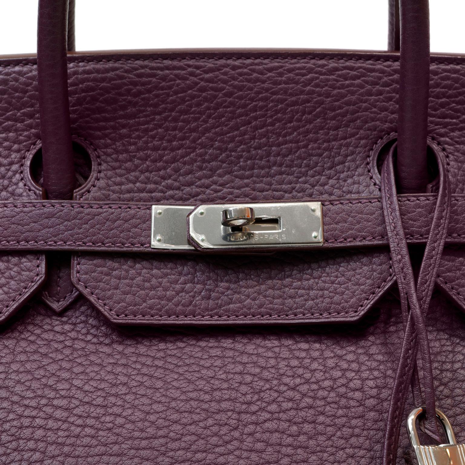 This authentic Hermès Violet Fjord Leather 40 cm Birkin is in pristine condition with the protective plastic intact on the Palladium hardware. Hermès bags are considered the ultimate luxury item the world over.  Hand stitched by skilled craftsmen,