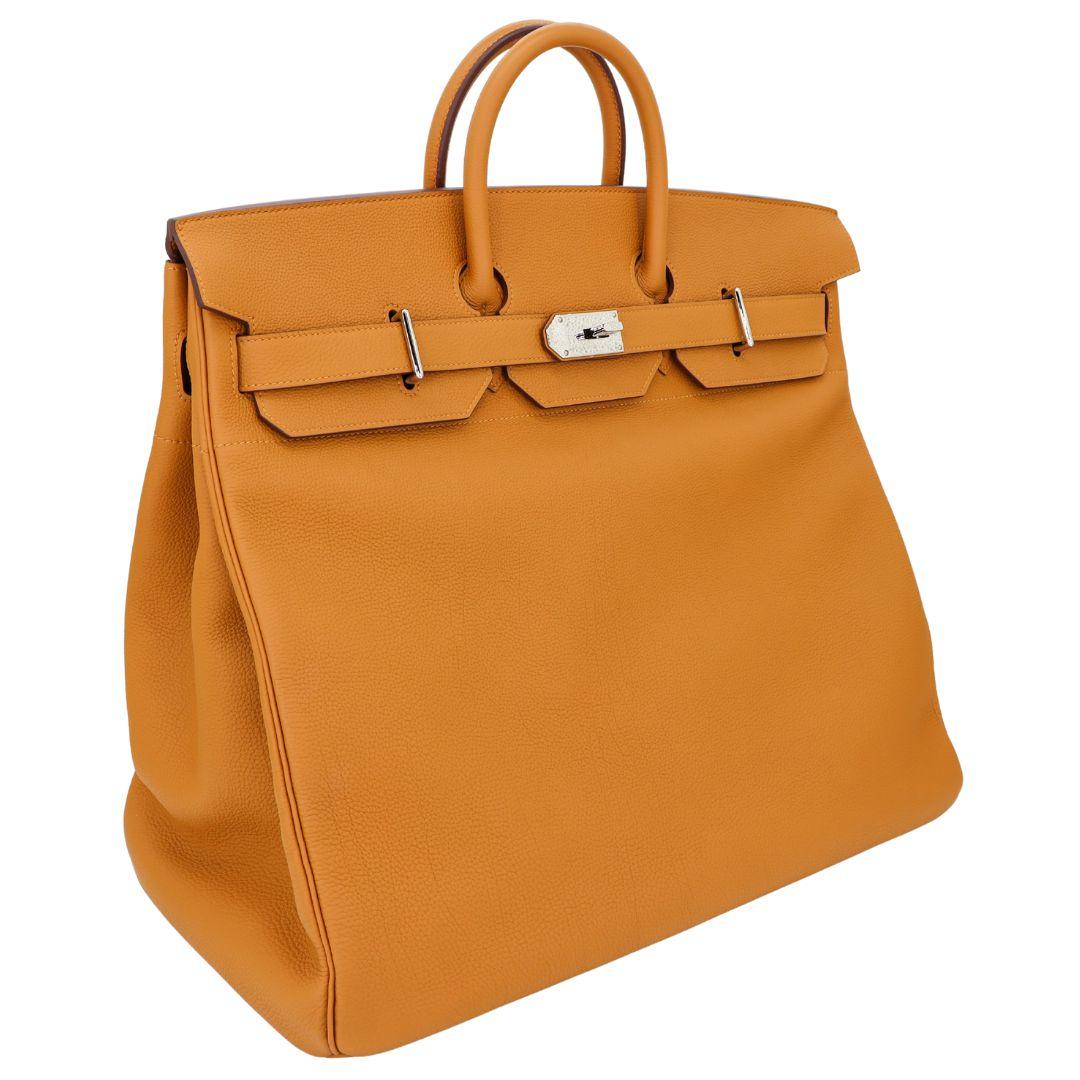 Brand: Hermès
Style: HAC
Size: 50cm
Color: Caramel
Material: Togo Leather
Hardware: Palladium Hardware (PHW)
Dimensions: 19.5