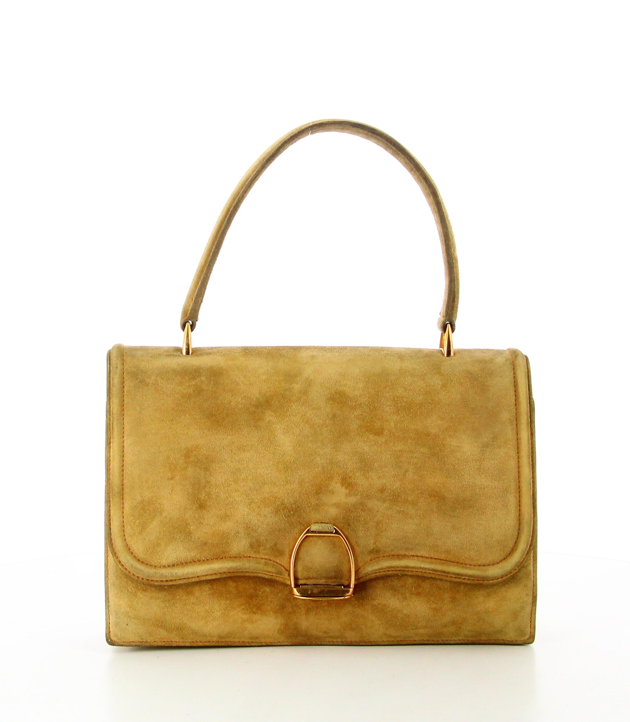 Hermes 60's Calfskin Doblis handbag

- Good condition. Shows signs of wear over time.
- Hermes handbag 
- Calf leather 
- beige 
- Small strap 
- Clasp: lock golden 
- Interior: two parts in beige leather