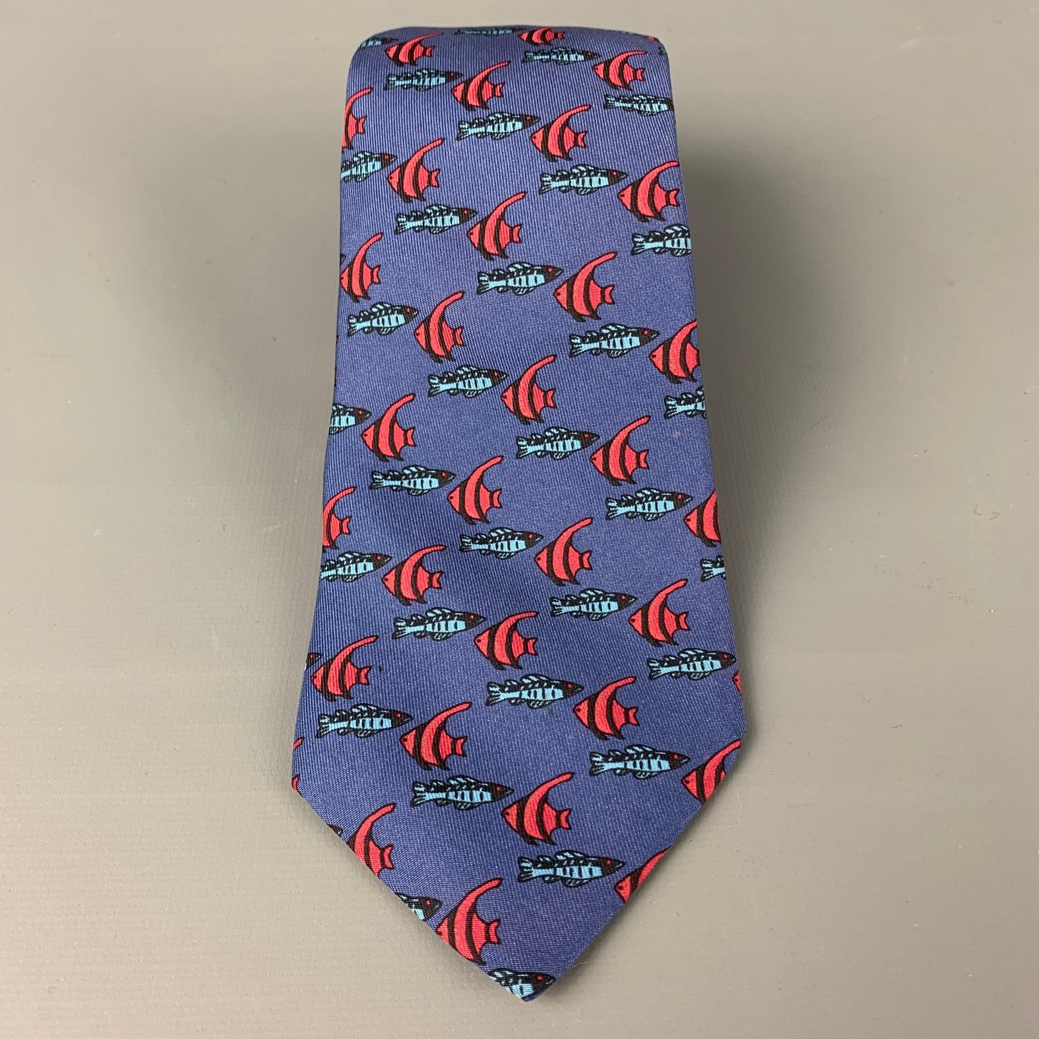 HERMES
 necktie comes in a blue & red silk with a all over fish print. Made in France. Very Good Pre-Owned Condition. 
 

 Marked:  7336 EAWidth: 3.25 inches 
  
  
  
 Sui Generis Reference: 118094
 Category: Tie
 More Details
  
 Brand: HERMES
