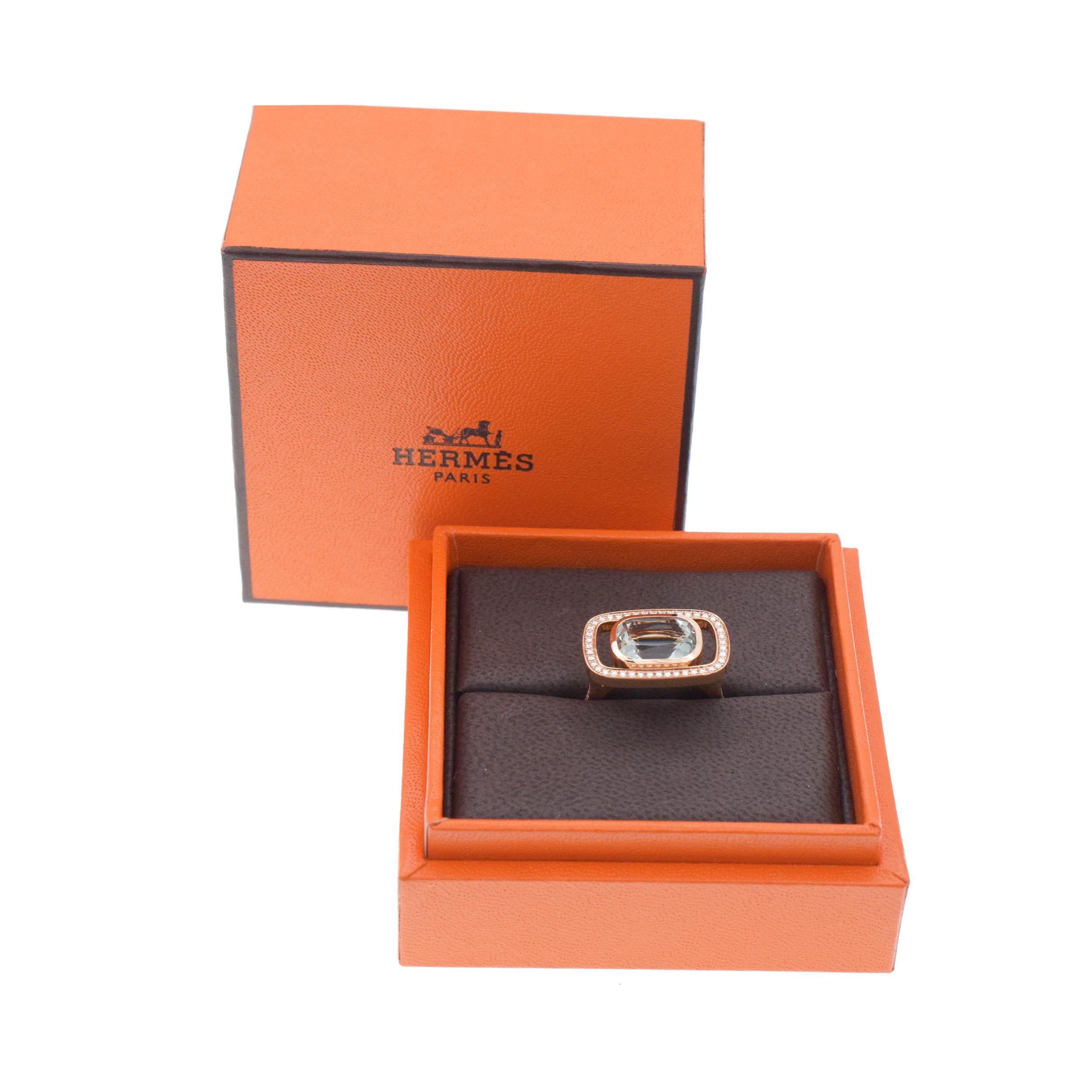 Hermes a L’ecoute cushion cut beryl and diamond halo ring in 18k rose gold.Inscribed: Hermes, Made in
France, 52,21AW168427, Au750. Stamped with French hallmark and makers mark. Comes with Original Hermes
Reciept and Certificate  ( retails for