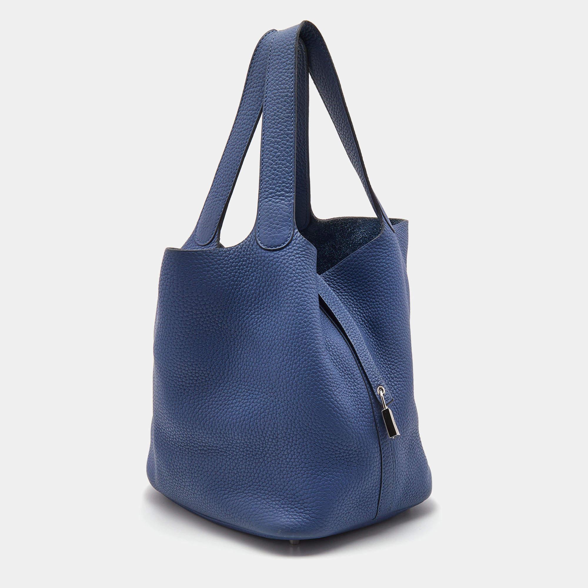 Designer bags are ideal companions for ample occasions! Here we have a fashion-meets-functionality piece crafted with precision. It has been equipped with a well-sized interior that can easily fit your essentials.

Includes: Original Dustbag,
