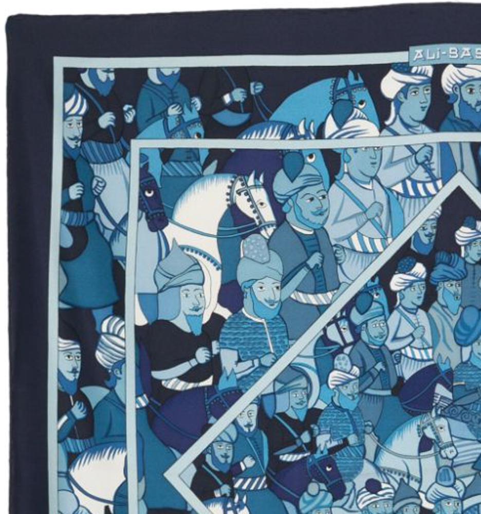 Hermès Ali-Baba by Pierre Peron silk scarf featuring a navy border, a Hermès signature. 
Circa 1970
In good vintage condition. Made in France.
35,4in. (90cm)  X 35,4in. (90cm)
We guarantee you will receive this  iconic item as described and showed
