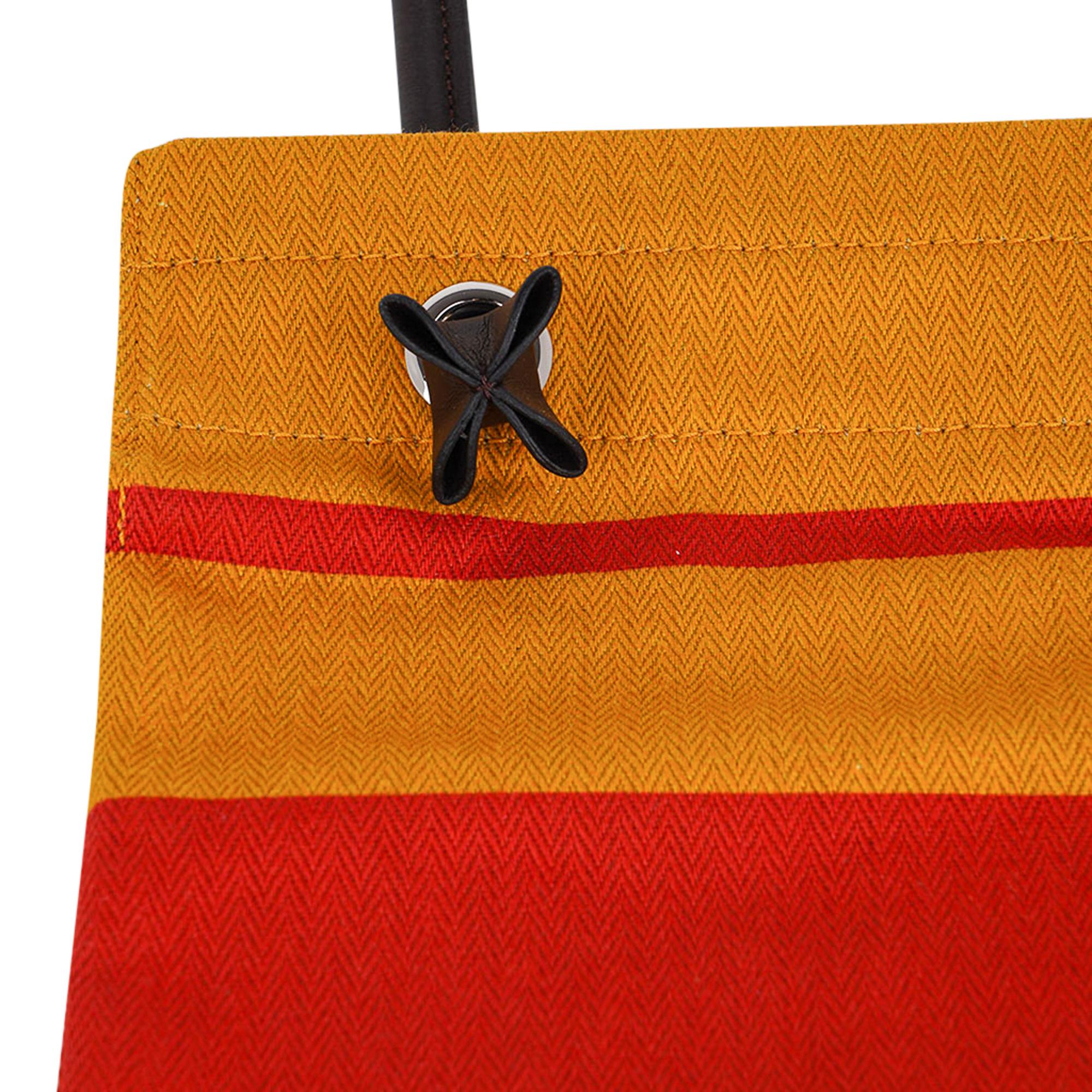 Mightychic offers a guaranteed authentic Hermes Aline featured in Rocabar Herringbone canvas.
The Rocabar colors are Ochre, Coral and Navy.
Ebene Swift leather shoulder strap.
Palladium hardware.
Inspired by the first 1800's racehorse blankets.
Can