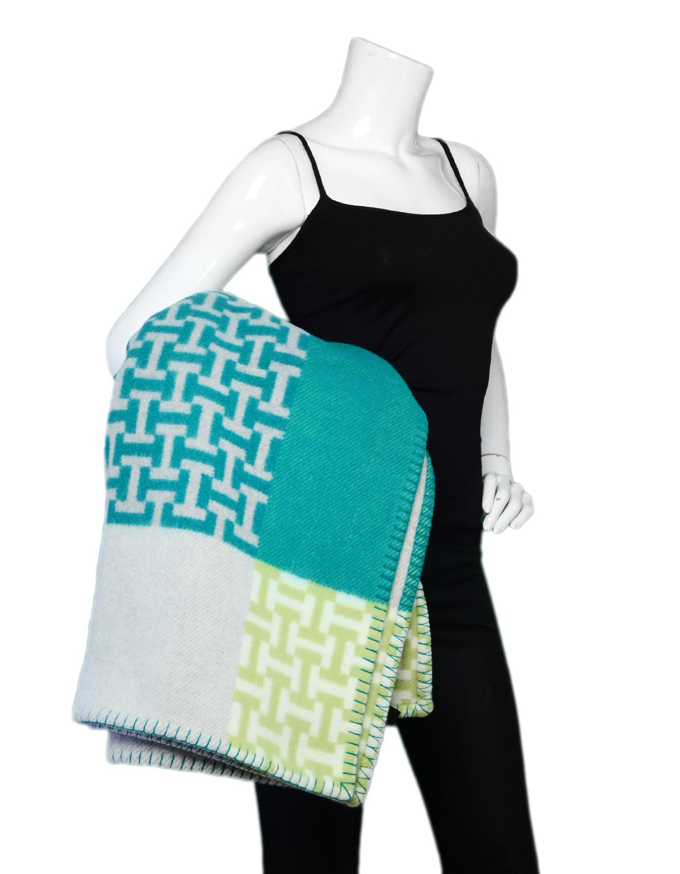 Hermes Aloe Vera Green Avalon Terre d'H Wool & Cashmere Throw Blanket

Made In: Great Britain
Color: Green, grey
Materials: 90% wool, 10% cashmere
Overall Condition: New
Estimated Retail: $1,600 + tax
**Please note that this item was purchased at an
