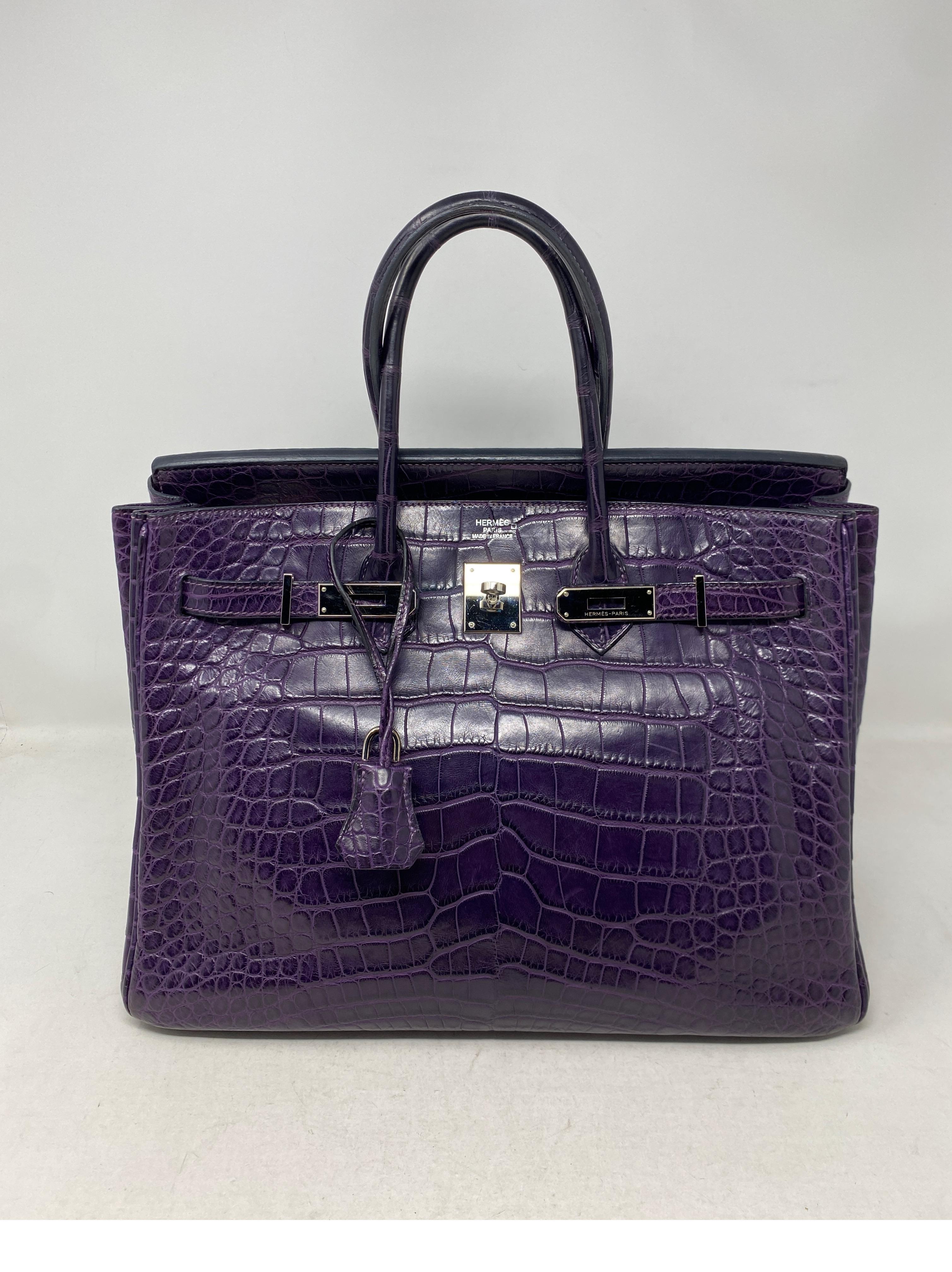 Hermes Amethyst Purple Crocodile Birkin 35 Bag. Gorgeous color and exotic skin. Excellent like new condition. Interior clean and unused. Palladium hardware. Great investment bag. Full set. Includes clochette, lock, keys, rain jacket, dust cover and