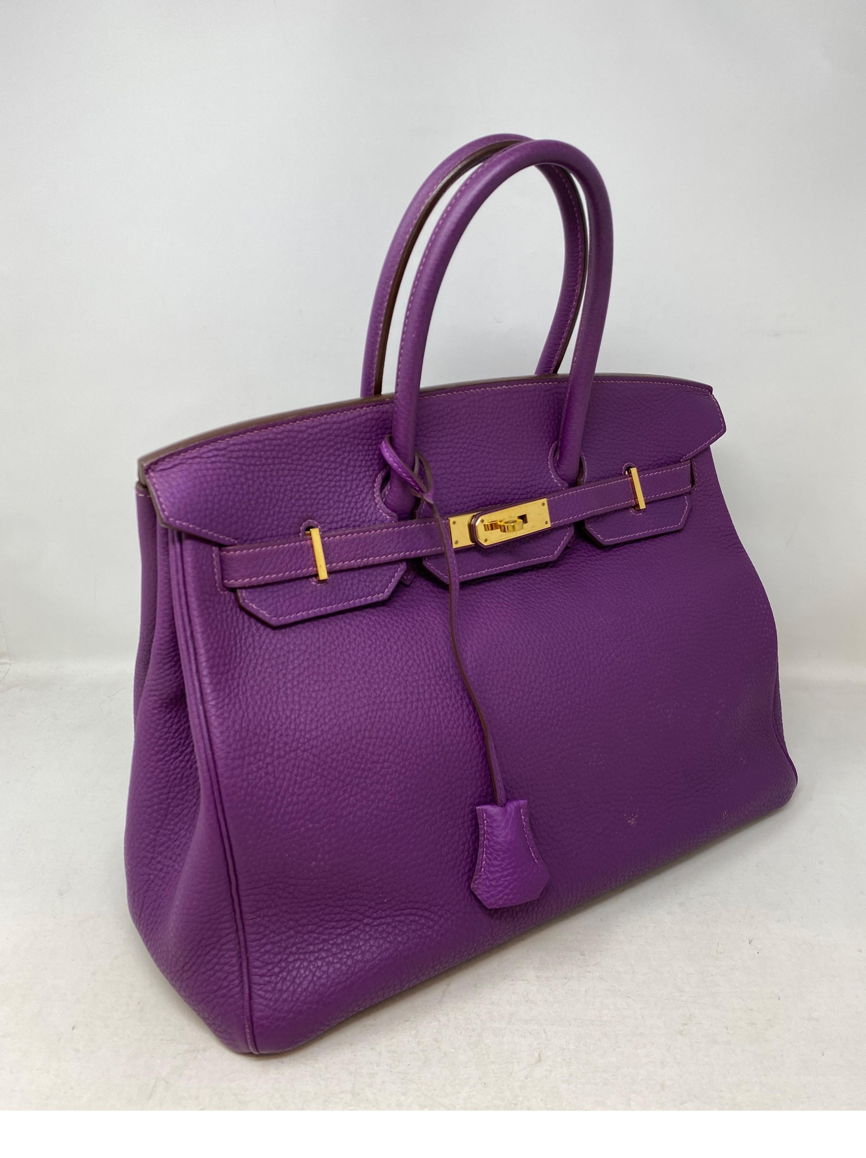 Hermes Anemone Purple Birkin 35 Bag. Good condition. Light spots on leather bottom front. Please see all photos. Interior clean. Rare purple color. Beautiful color and bag. Includes clochette, lock, keys, and dust bag. Guaranteed authentic. 