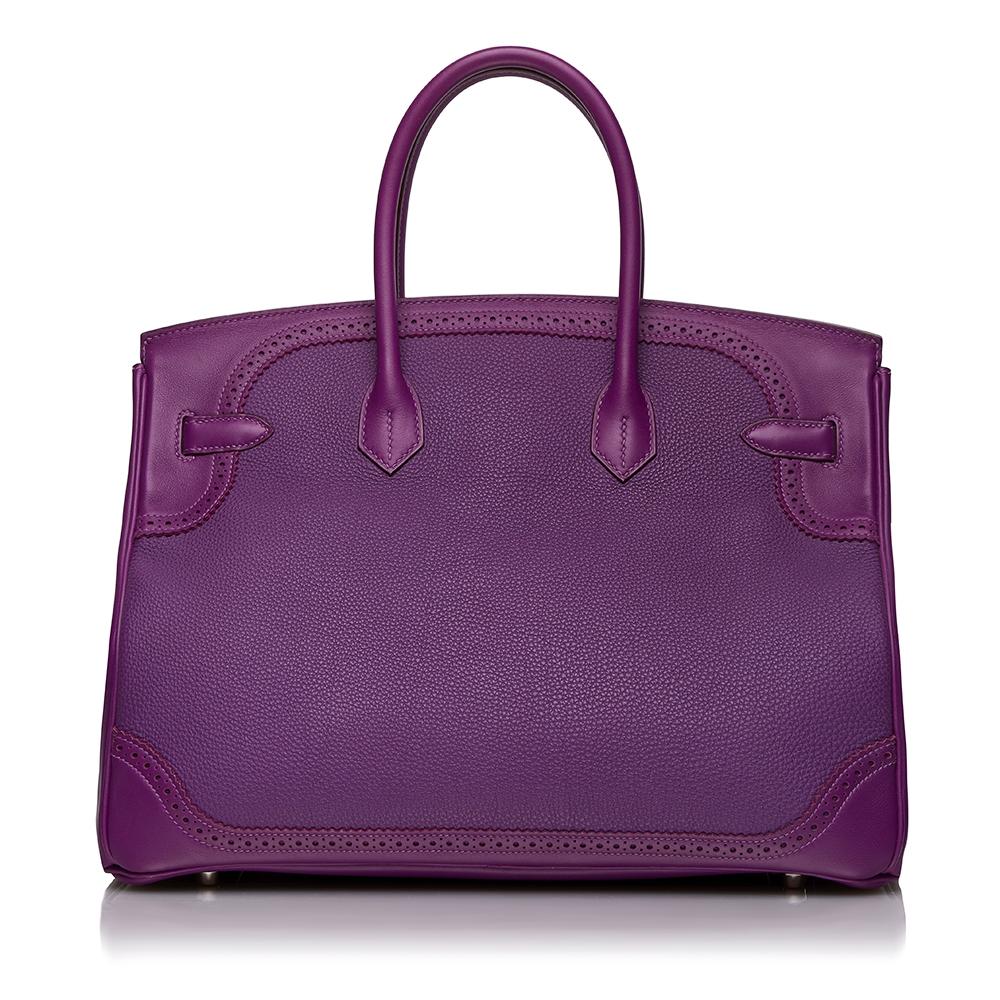 Highly sought after, in an elegant and enchantingly feminine shade of Anemone, this 35cm Ghillies bag is a truly dazzling collector's item and adds several unique twists to the traditional Hermès Birkin. Crafted from a striking combination of