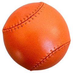 Pelota antiestrés Hermes de cuero naranja, años 2000 Francia