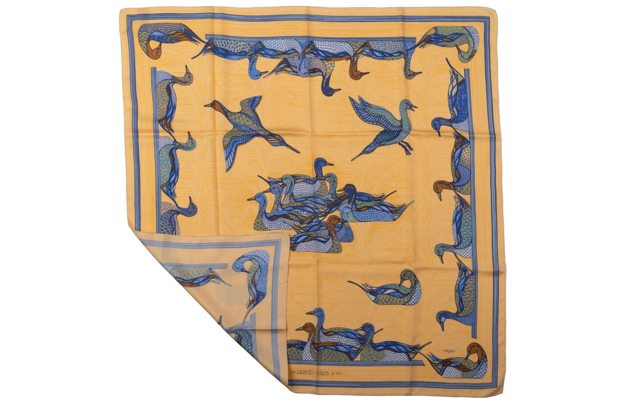 Hermes apricot and blue ducks design silk scarf. Excellent condition. No Tag.
