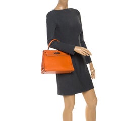 Hermes Apricot Clemence Leather Palladium Hardware Kelly Retourne 28 Bag