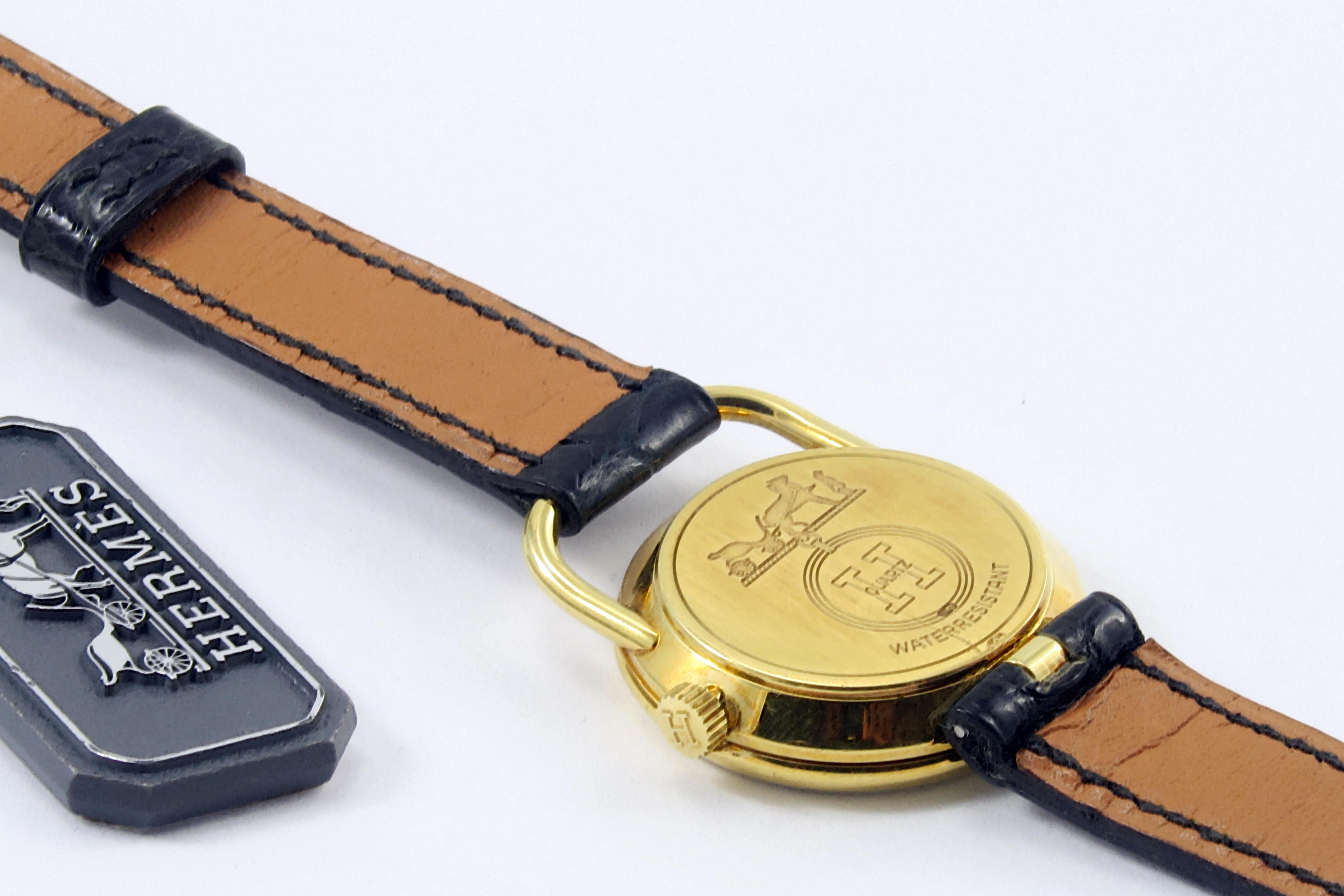 Women's Hermès Arceau 18 Karat Gold Watch Small For Sale