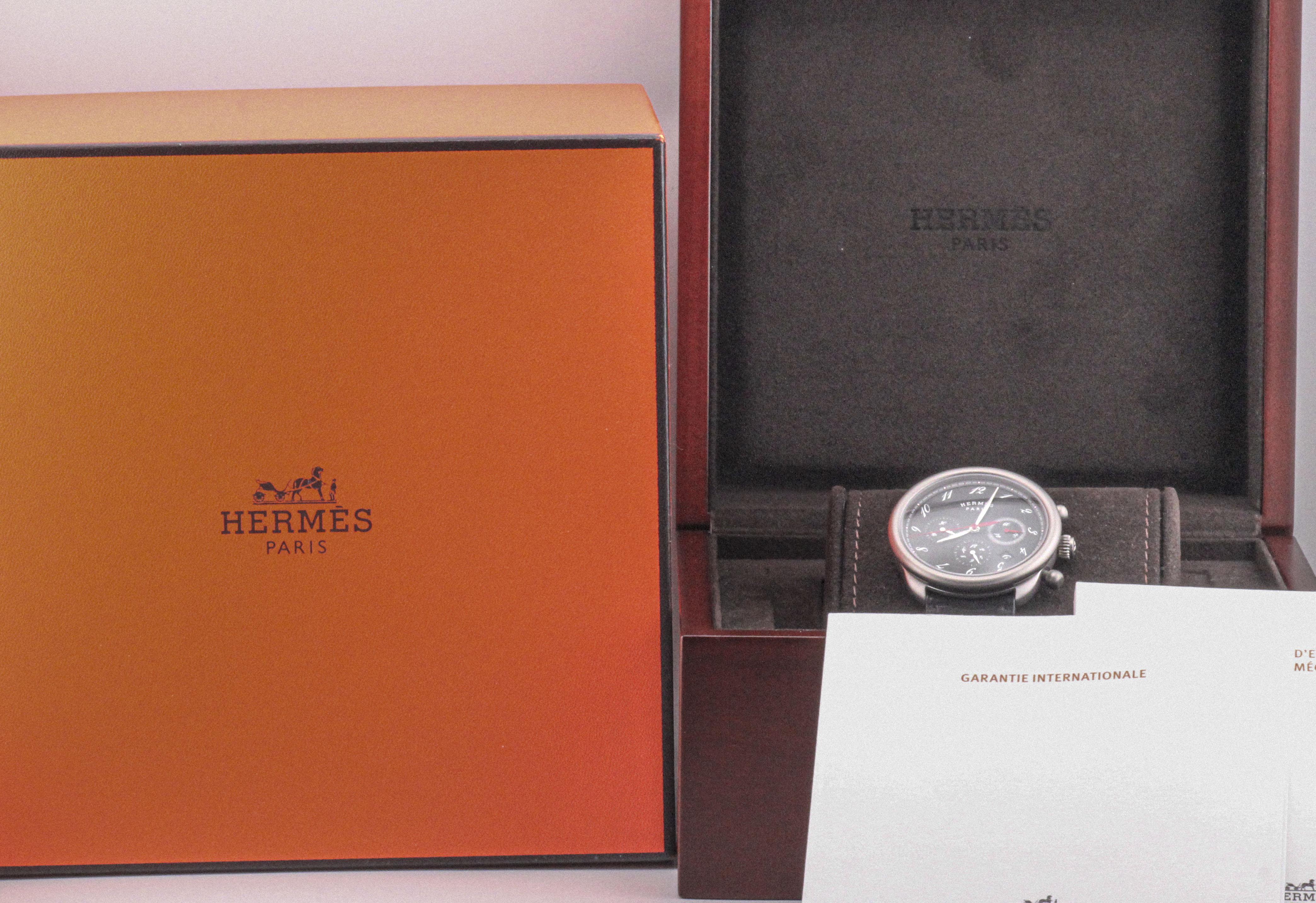 The Hermès Arceau AR3.941 represents the perfect harmony of Parisian elegance and contemporary horological engineering. Crafted in lightweight yet exceptionally robust titanium, this distinguished chronograph reinterprets the iconic Arceau