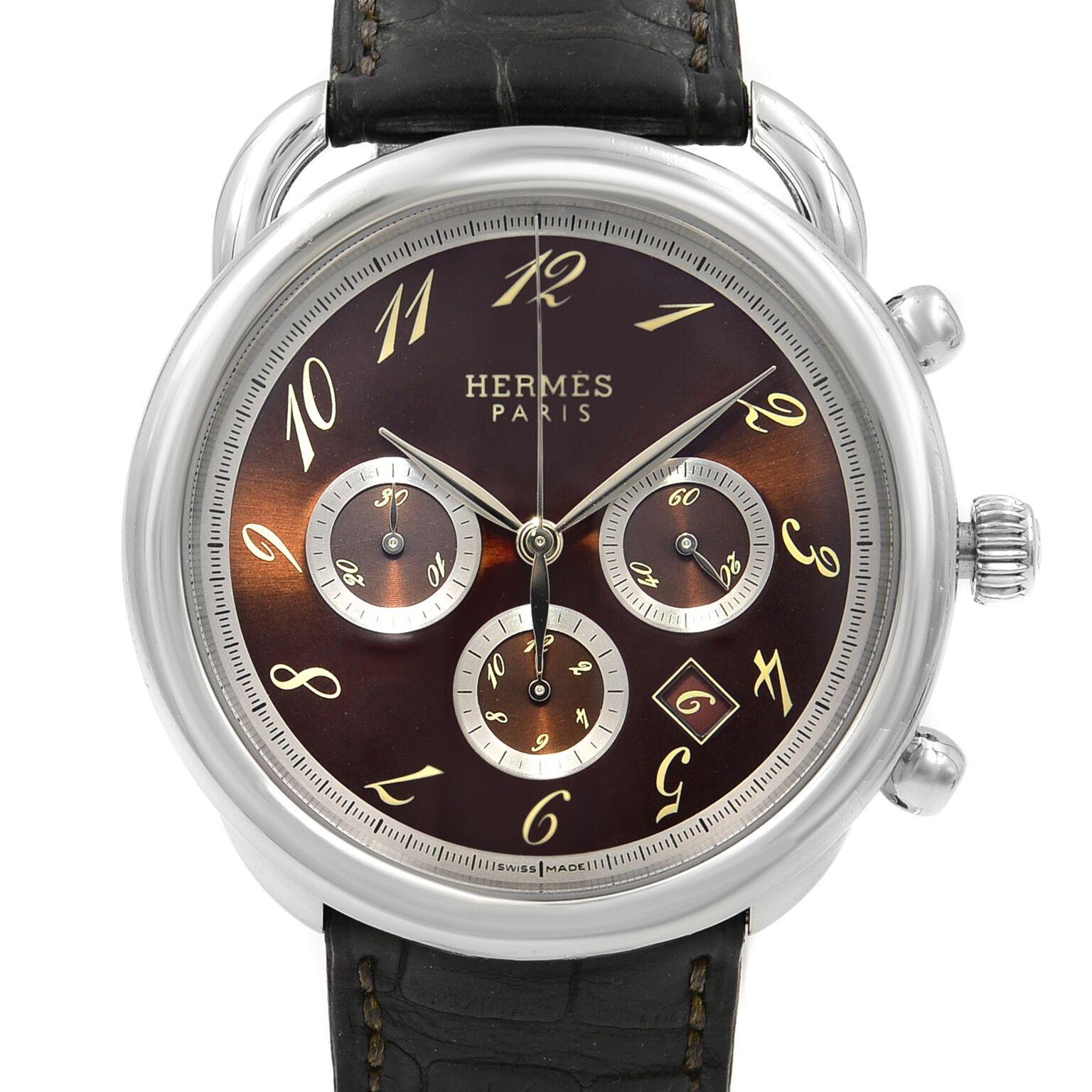 This pre-owned Hermes Arceau  AR4.910 is a beautiful men's timepiece that is powered by mechanical (automatic) movement which is cased in a stainless steel case. It has a round shape face, chronograph, chronograph hand, date indicator, small seconds