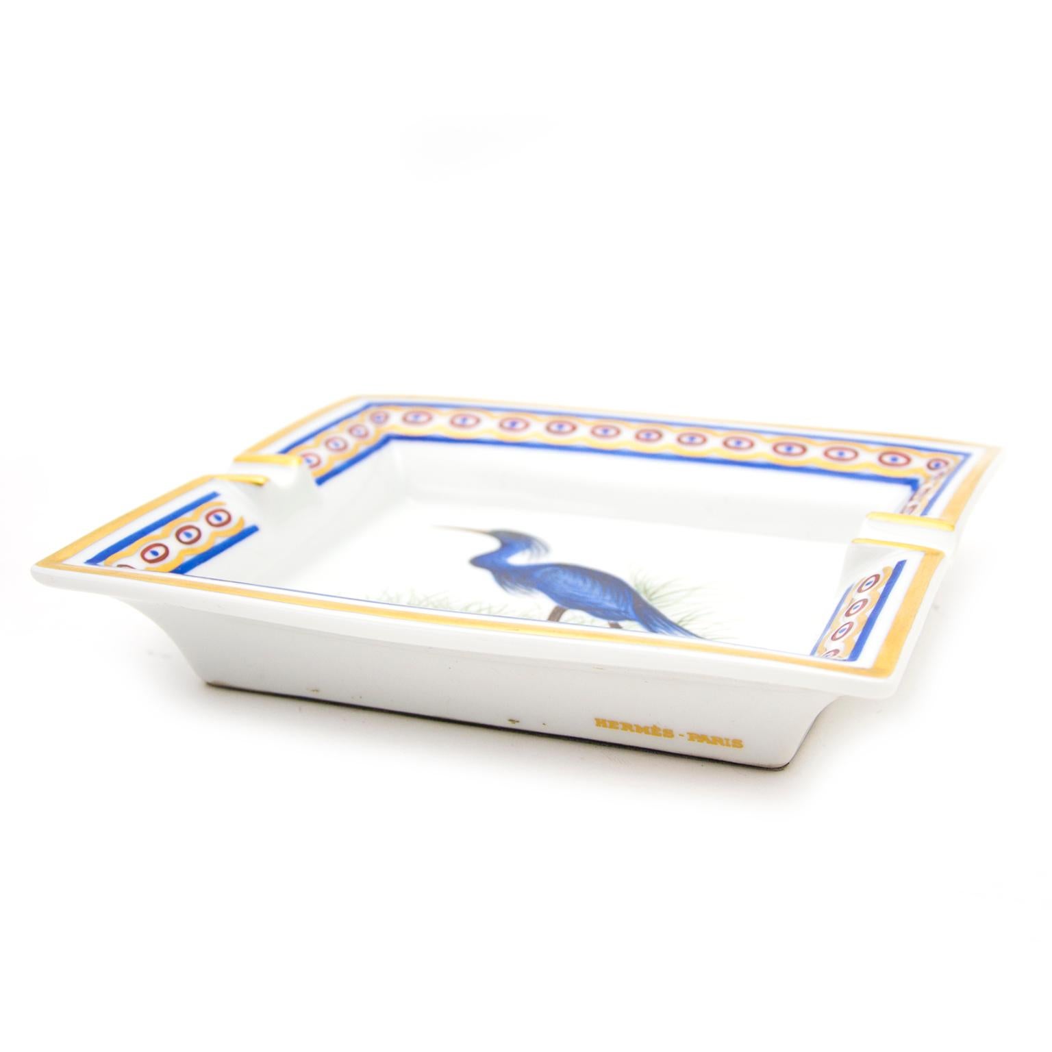 In good condition

Estimated retail price: €445

Hermès Ashtray Blue Bird 'Florida Caerulea'

This gorgeous ashtray in Limoges porcelain is a true addition to any home. The ashtray depicts the Florida Caerulea, a blue bird.

Finished with a gold