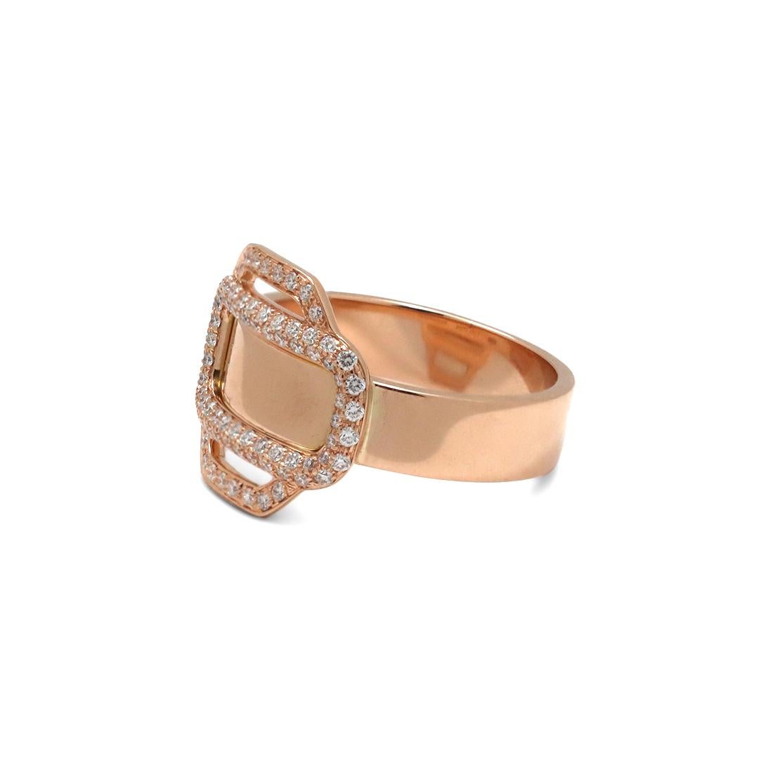 Authentic Hermès 'Attelage D'Or' ring crafted in 18 karat rose gold and pave set with approximately 0.35 carats of high-quality diamonds. Designed by Pierre Hardy, the reimagined carriage buckle motif is a callback to the house's origins. The buckle