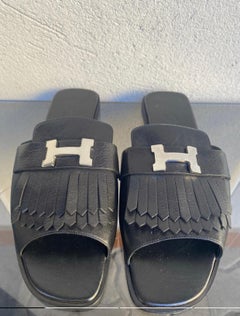 Sandali piatti in pelle nera Hermes Auteuil