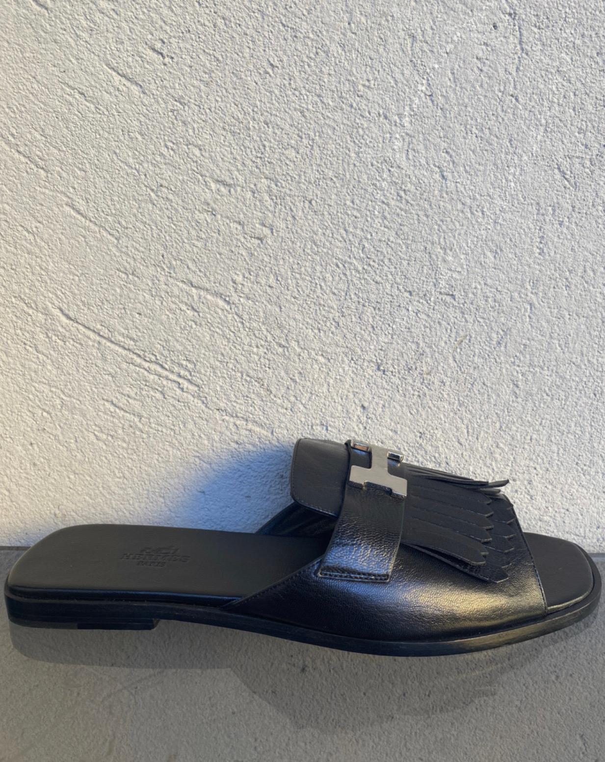 Black Hermes Auteuil black leather flat sandals