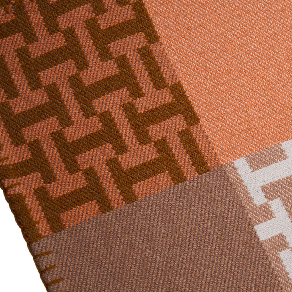 Guaranteed authentic Hermes Avalon Terre D'H blanket featured in Corail.
Impossibly soft hand spun and hand woven Cashmere, this gorgeous Hermes blanket will elevate any room you choose
to display it in.
Beautiful soft palate of coral, ecru and